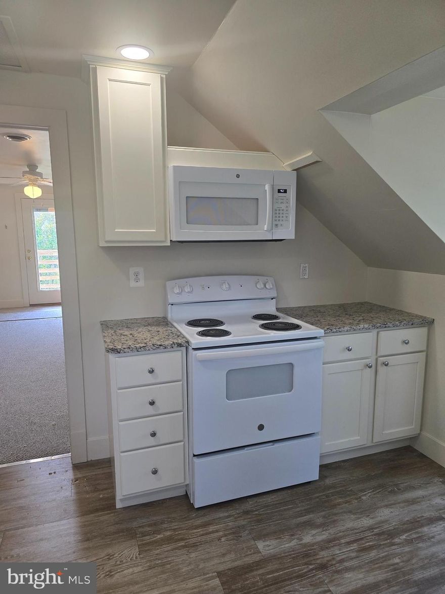 Fully remodeled second-level studio efficiency located in the heart of the downtown Bel Air district. Private entrance and private parking. Everything is newer. New appliances, carpet, paint, remodeled gourmet kitchen and bathrooms. Granite countertops in the kitchen and bathroom. Electricity, heat, ground maintenance, lawn service, trash removal, and water are included in the monthly rent payment. On-street and off-street parking. Walking distance to everything in downtown Bel Air!