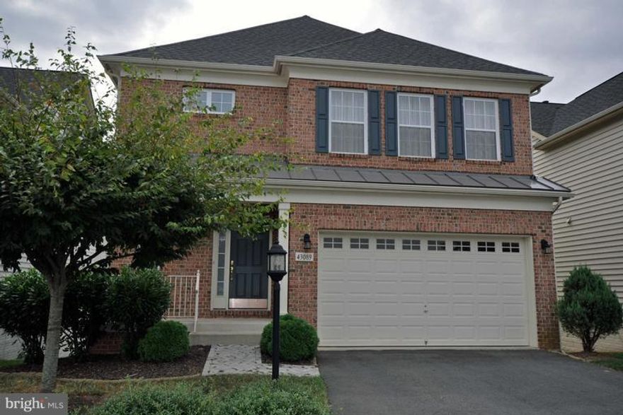 3 finished levels w/ bump out on each level. Main level has hardwood floors, gourmet kit, 42" cabinets, granite, cooktop island. Back Deck, walk-out basement, exercise room, large rec room, office w/ built-in shelves and lots of storage. Huge MBR w/ vaulted ceiling, sitting area, His/Her closets. Master bath has double vanity, separate tub, shower, toilet area. Easy Commute.