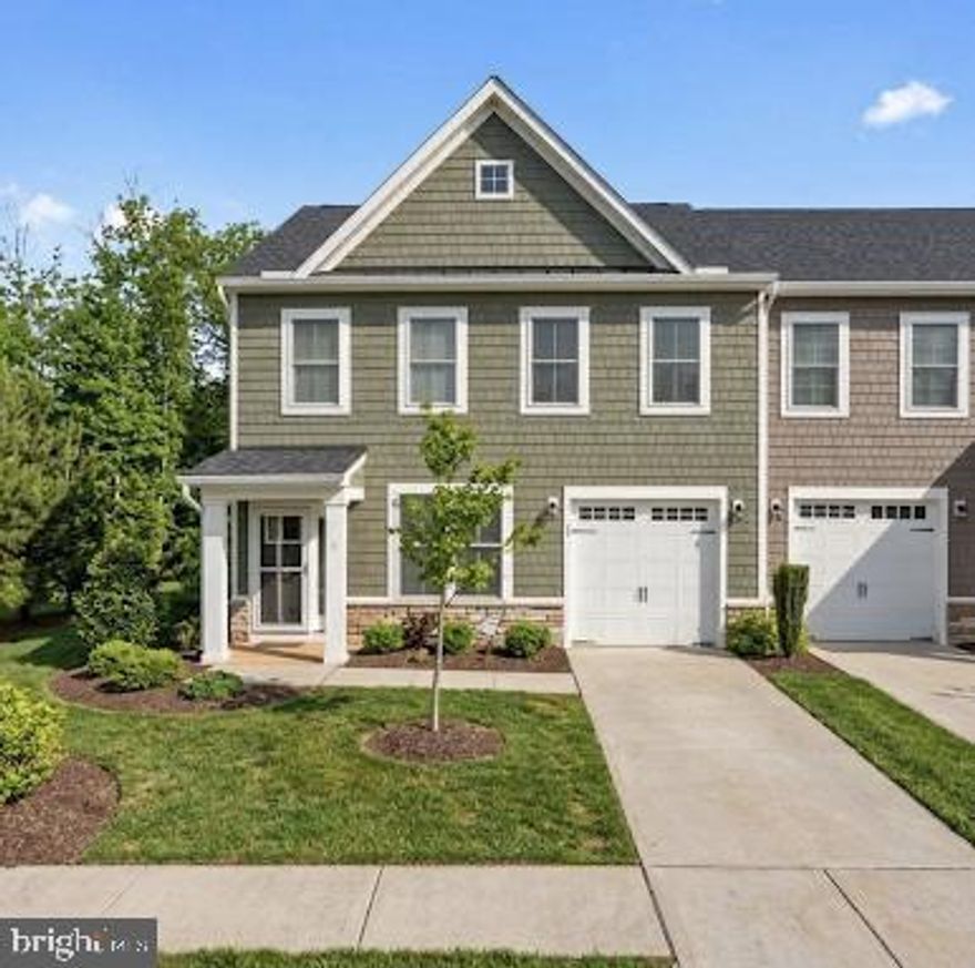 HUGE price improvement and READY for you! Beautiful, updated, and FRESH!!! Large end-unit, patio home backing to trees with great privacy in a 55+ community!   Recent updates in 2025/2026 include a high-end gourmet gas range with built-in convection oven/air fryer,  Custom tile backsplash in the kitchen, all interior doors upgraded to lever handles,  Large designer ceiling fan in the living room, Ceiling fans in all bedrooms, Designer chandelier in the dining room, High-end satin nickel bathroom fixtures, and luxe drapes for every window! Additional features to the home include a gorgeous floor-to-ceiling gas stone fireplace with blower, an ADA-compliant primary bedroom entry with wide doorways. This home is light-filled, private, and EXTREMELY well-maintained!! Don't Miss Out on this GEM!!!