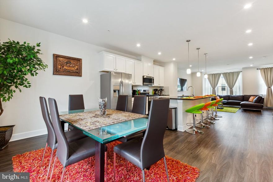 A sleek townhome nestled in a great location, walkable to the Largo metro and convenient to shopping and restaurants. You deserve it, match your home to your elegant and fabulous lifestyle! This 3-level, 4 bedroom spacious townhome is modern with a cosmopolitan look and feel, and the pet friendly rental you’ve been waiting for. Luxury vinyl flooring on the entire 2nd floor where you will entertain with pride in the upgraded kitchen boasting an oversize island, 5-burner gas stove, and quartz countertops. You will love the lighting for the pics you will take when entertaining: upgraded recessed lighting package, pendant lights, and large windows. 2-car garage with parking pad for additional 2 cars, full size deck for al fresco dining, bathroom on each floor—this home checks so many of your boxes. Plus, library at entrance of subdivision with EV charging stations! Quick access to all commuter routes: DC, Alexandria, National Harbor, Annapolis.