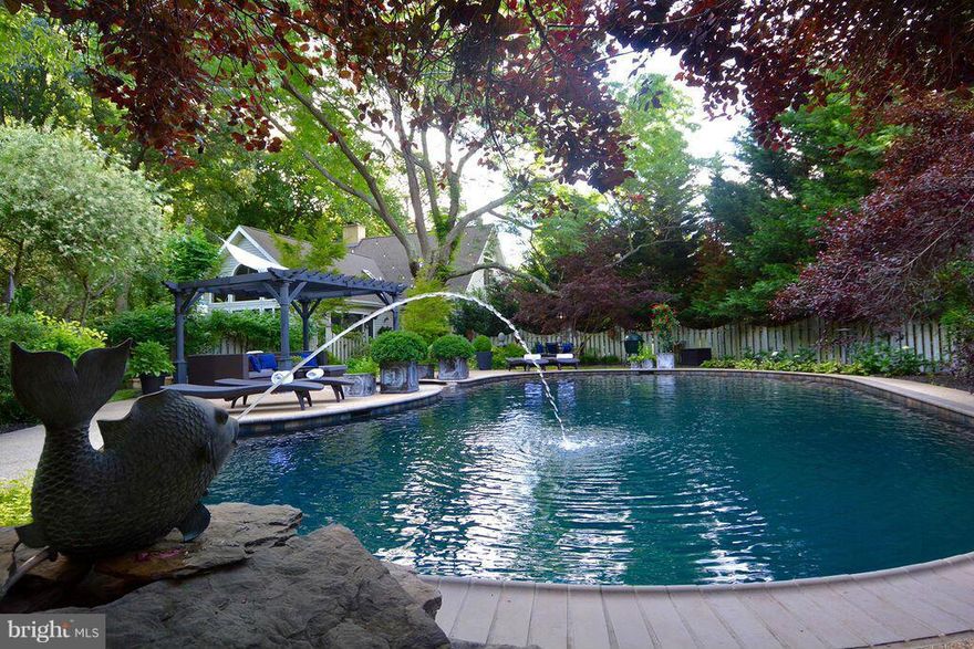 Fully renovated Cape Cod, with wrap-around porch, steps away from the West River. Professional landscaping, custom wood deck and stone patio surround the serene salt-water pool and spa. Pristine details and unsurpassed style throughout with granite and marble counters, crystal chandeliers, hardwood flooring, soaring ceilings, massive windows, and marble-clad shower and tub in the master.