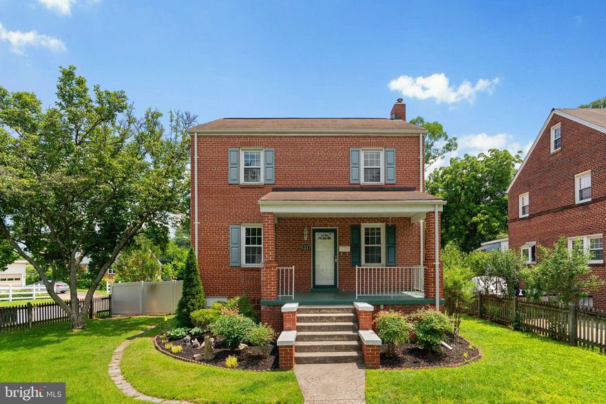 Welcome to 6317 Taylor Road, a charming all-brick Colonial perfectly positioned on a spacious corner lot in sought-after Riverdale. This beautifully maintained 4-bedroom, 2-bath residence blends classic character with thoughtful updates, offering comfort, flexibility, and unbeatable location. Step inside to find oak hardwood floors that flow throughout the top two levels, including the inviting living room, which features a wood-burning fireplace, vinyl tilt windows, and Levolor blinds for added comfort and style. The spacious dining room is brightened by a bay window and leads to the renovated kitchen, complete with oak cabinetry, Corian countertops, updated appliances, and luxury plank flooring—making meal prep and entertaining a pleasure.

From the kitchen, step out to a generous rear deck overlooking a fully fenced backyard with mature trees and a large shed—ideal for outdoor entertaining, gardening, or pets. Off-street parking adds everyday convenience. Upstairs, you'll find three spacious bedrooms with ample closet storage and an updated hall bath featuring a double vanity and ceramic tile. The lower level expands your living space with a fully finished in-law suite, including a recreation room, private bedroom, full bath, office area, laundry room with an extra refrigerator, and a walk-up exit—perfect for guests, remote work, or rental income potential.

Located just a short walk to the Riverdale MARC Train Station, with easy access to the College Park Metro, this home is a commuter’s dream. You're minutes from Whole Foods, Starbucks, local dining, shopping, the University of Maryland, and major commuter routes like Route 1, 295, and 495. Don’t miss this light-filled, versatile Colonial in one of Maryland’s most connected and charming neighborhoods. A rare opportunity to enjoy space, location, and timeless style in the heart of Riverdale.