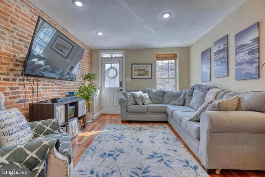 Let's talk about having your cake and eating it too!  This nearly 2000 SF, turn key home, nestled between Fells, Canton, and Butchers Hill has it all!   The sun filled main level features an updated kitchen, spacious living and dining area, coat closet, and laundry/powder room,   The second level features 2 bedrooms both with en-suite baths, generous closets, and hardwoods throughout.  On the third level you will find a primary bedroom with large walk in closet, and spa like bathroom.   Enjoy entertaining on large rear patio area complete with fish pond .   Don't miss out on this wonderful home at such an amazing price point!!!