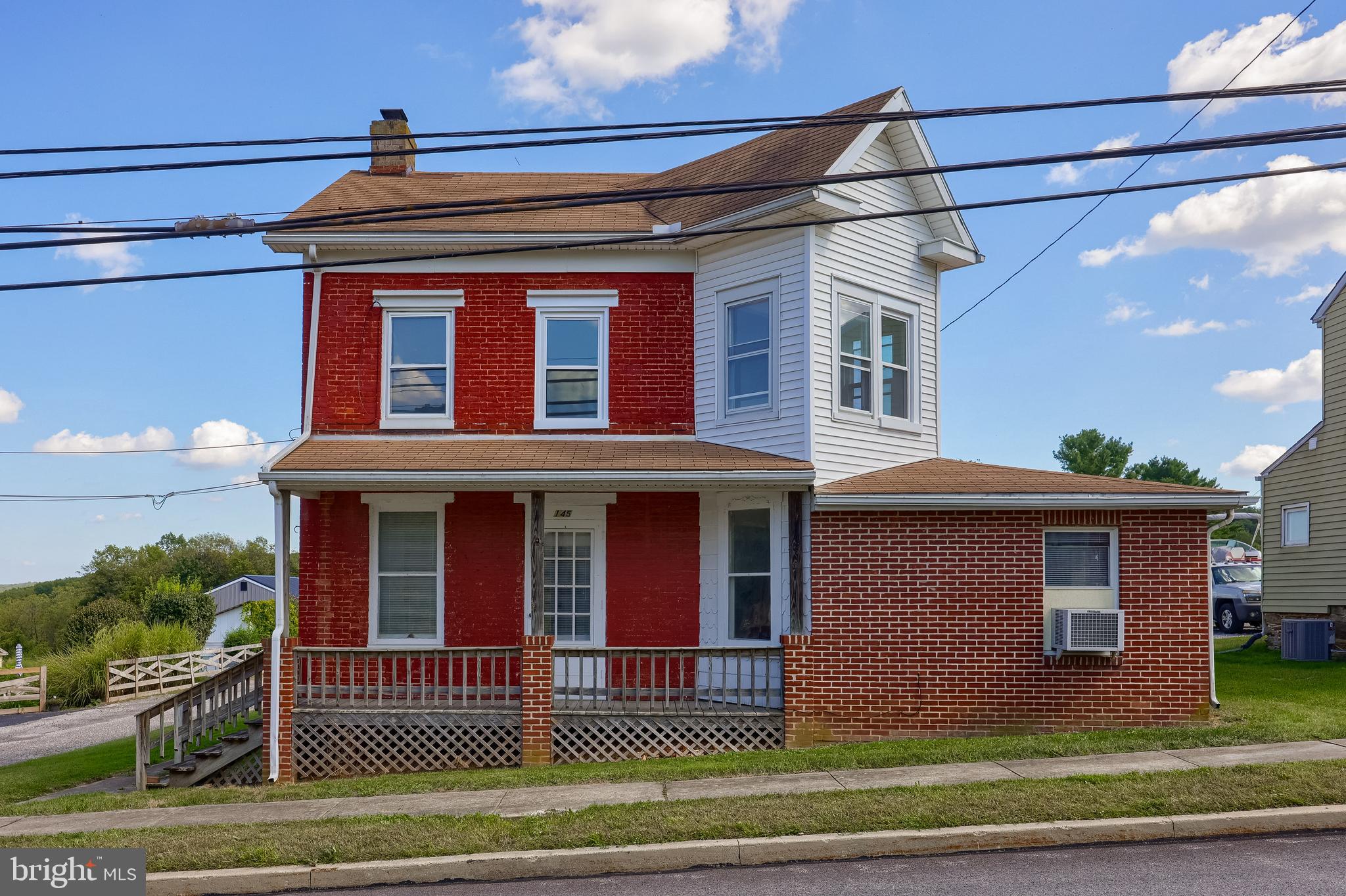 Check out this 4 bedroom home in Dallastown Schools! Located only minutes from I-83 and MD makes this home great for the commuter. Enjoy many local amenities like Brown’s Orchard & Farm Market and The Markets at Shrewsbury. The main level offers one floor living with two bedrooms, a full bath, and laundry room. Enjoy the spacious screened-in porch for three-season entertaining. Directly off of the kitchen is great room with a vaulted ceiling. The upper level includes a kitchenette area which would be perfect for guests. Two additional bedrooms, a full bath, and bonus room complete the upper level. This great lot offers over an acre with countryside views and a parking pad in the rear.