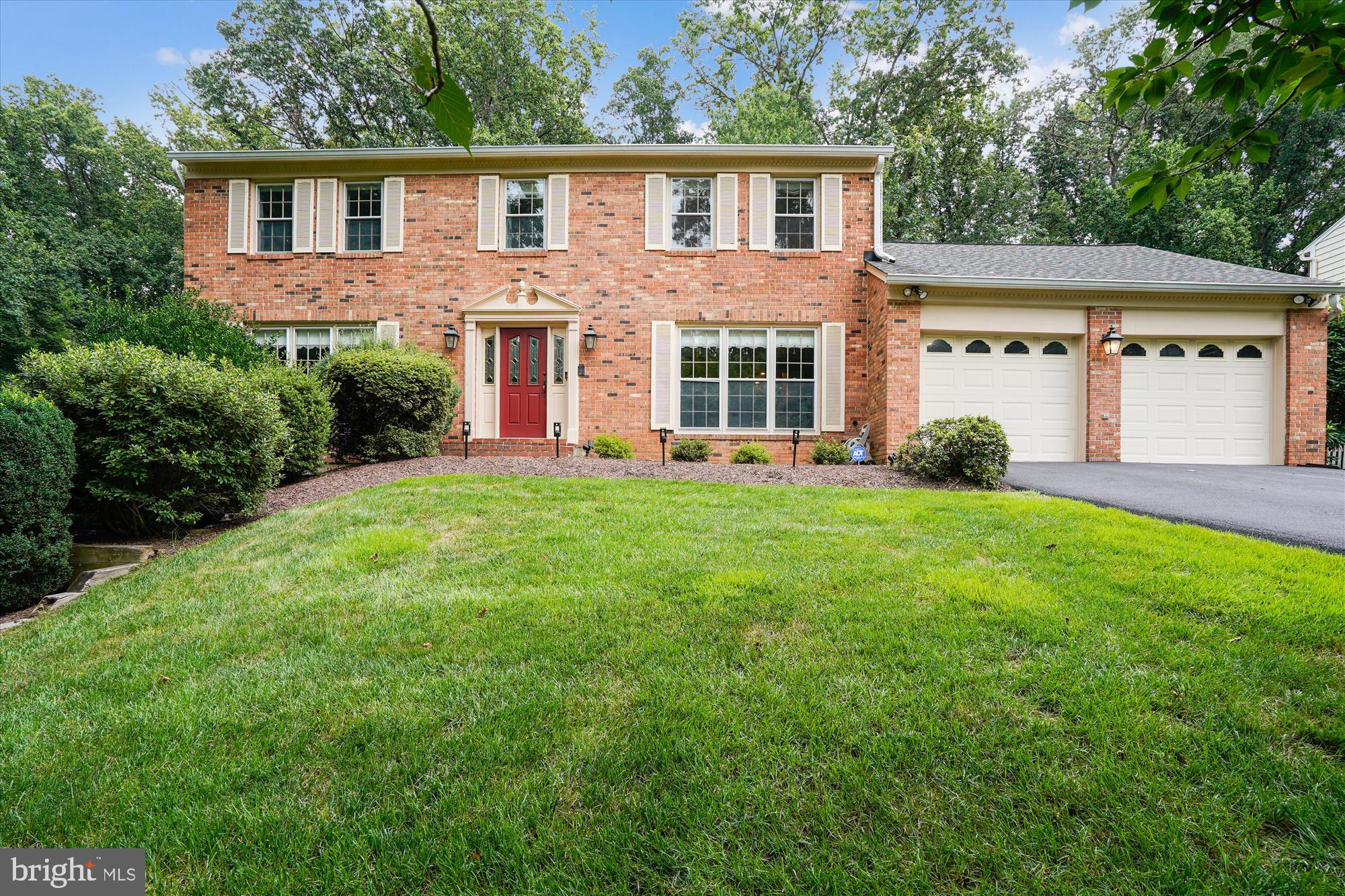 Welcome to this classic Colonial w 2 car Garage, breathtakingly sited on the most perfect Half Acre lot in popular Miller Heights. This home has been lovingly maintained by original owners and has an enormous backyard with wooded views. It offers about 4,600 square feet of sunlit space on 3 levels, boasting 4 Bedrooms, 3 full Baths and 1 Half Bath, as well as a cozy gas fireplace. It features hardwood flooring on the main level and walk-out lower level. As you walk up the brick pathway you are greeted by a handsome front door with leaded glass panels and matching sidelights. The Foyer is spacious and is flanked by the Living Room and formal Dining Room. Both rooms overlook the front garden. The Dining Room enjoys Crown Molding and Chair Rail details and opens to a Butler's Pantry featuring a Wine Fridge, Wine Rack and Wet Bar with Cherry Cabinetry and granite countertop. The adjacent Kitchen boasts yet another Pantry. The Cherry Kitchen also boasts an abundance of Cabinetry with pull-outs, Stainless Steel appliances and Granite countertops. It is open to the Breakfast Room and enjoys access to the deck through French Doors. It flows seamlessly into the Family Room with a Brick Hearth Gas Fireplace and beamed ceiling. A Mudroom/Laundry Room enjoys access to a second Deck, a second walk-in Pantry (storage galore!) and the Garage. A renovated Half Bath completes the main level. The upper level boasts a spacious landing with large linen closet and offers 4 Bedrooms and 2 Full Baths. The Primary Suite presents a spacious Bedroom, a Sitting Room with 2 walk-in closets and a renovated ensuite Bath. The ensuite features 2 separate vanities with granite countertops as well as a separate tub and shower. Three ancillary Bedroom share a Hall Bath. The Walk-out Lower Level is enormous and offers a large Rec Room with Billiards area, a Wet Bar, and access to the Patio. It also features a Den/Guest Room with Full Bath! Updates include Furnace & AC replacement 2024, Chimney Crown replacement 2024, Kitchen & Foyer Hardwood Floor Refinished 2023, Half Bath Renovated 2021, Roof, Siding, Deck 2019, Primary Bath Renovation 2019, Driveway Resurfaced 2018, Hot Water Heater 2010, Gas Logs for Fireplace 2010, 2 Septic System Distribution Boxes 2008, Kitchen Renovation 2005. Outdoors you'll find a well-manicured garden as well as two Decks (one with built-in seating) and 2 Patios --- all situated to overlook the enormous "Playable" backyard backed by woodland. Miller Heights is a serene and cloistered enclave just a short drive from the historic town of Oakton. It is convenient to several major commuter routes including I-66, Rte 50, Rte 29, and Fairfax County Parkway and just a short drive from the Beltway and Dulles Toll Road and Vienna Metro. Yet, despite its central location, it is literally nestled in the heart of County Parkland where bike and walking trails abound. Oakton High School Pyramid. OPEN SATURDAY 1 TO 3.