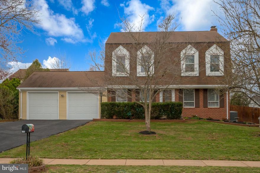 Well maintained center-hall Colonial with brand new roof, new windows and new Carrier HVAC system!  Home has been freshly painted "Agreeable Gray" and has stainless steel appliances and granite counter tops in the kitchen.  Huge 20X14 Deck off the family room over looking large .23 acre fully fenced lot.  Nice wood burning fireplace in family room plus separate living and dining room finish off the first level.  Upstairs you will find a large master retreat with en-suite master bathroom.  Two front bedrooms with window seats make the perfect reading areas.   A fourth bedroom and a hall bath with new tile flooring complete the top level,  The basement offers a finished game room, stdy and laundry area.  This amazing home is not only situated on a perfect cul-de sac but it is just one traffic light to Route 7 and minutes from Fairfax County Parkway.  An great house and a commuters dream!