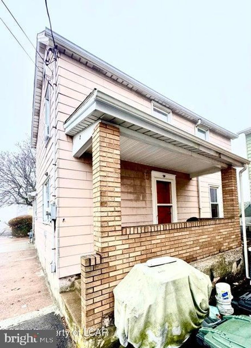 Affordable 3-bedroom home with gas heat and hot water. Fenced in yard on 3 sides. Front and back porch. Great starter home or investment. ***AGENTS, PLEASE SEE PRIVATE REMARKS.***