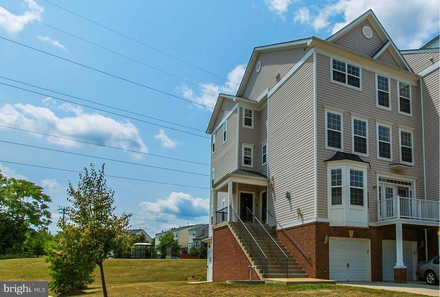 Lowest Price in the Area. Check out the Tour. Spectacular End Unit Town home with 3 Bed 2 1/2 Bath. Kitchen with New Hardwood floors, SS appliances, Corian Counter tops,Ceramic Tile in all baths, Second floor w/Two Large Bedrooms. Huge Master Suite level w/Huge Walk -In-Closet, Master Bath w/Sep Shower, Soaking Tub.Close to Shopping,Restaurants,Playgrounds,Toll Road & New Reston Silver Line Metro.