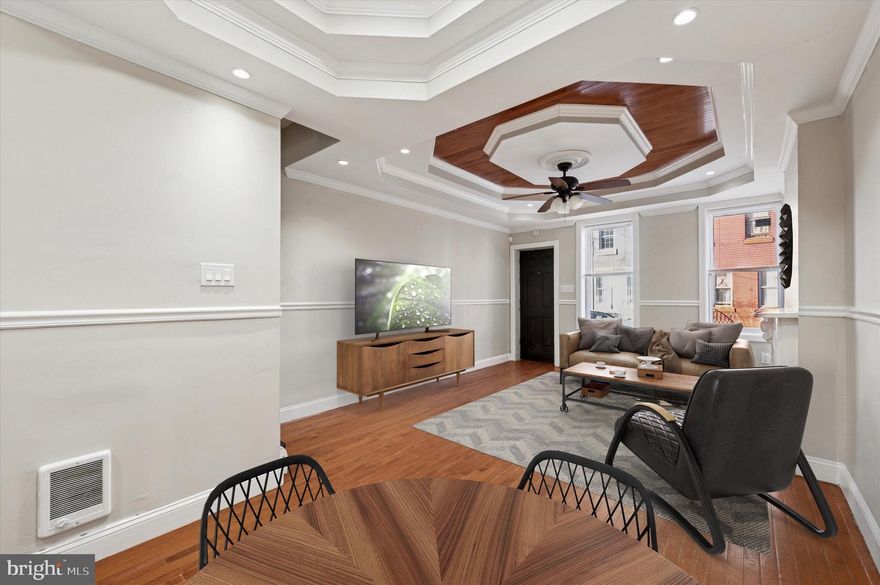 Discover the perfect blend of classic Philly charm and modern comfort at 502 West Cumberland Street in vibrant Norris Square. This spacious five-bedroom townhome, nestled in a welcoming community close to parks, fresh markets, and easy city access, offers an open-concept living area with soaring vaulted ceilings and elegant crown molding that flows seamlessly for everyday gatherings. With one full bath, one half bath, and a generous backyard oasis for summer barbecues or quiet retreats, it's your ideal spot to unwind in the heart of Kensington.