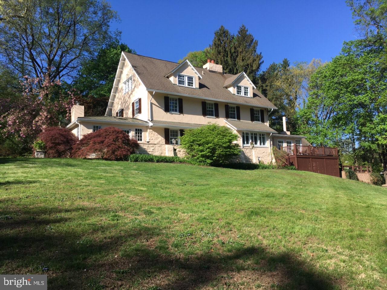 A short walk to the Ardmore Station to hop on the Paoli - Thorndale Line, the Amtrak to NYC or to shop and dine at Suburban Square, is this century old gem with the walk score of a city property. This beautiful perfectly maintained center hall colonial with gleaming hardwood floors is the one you have been searching for. It has been maintained and improved to the highest standards over the last fifteen years. Pause a minute on the blue stone front terrace to take in the spacious, manicured property, before entering the charming center hall. Your formal living room and dining room, both with beautiful fireplaces are ideal for entertaining. Imagine fabulous dinner parties with friends warmed by roaring fires. The custom home office with magnificent built in desk, custom wood work, sky lights and french doors is sure to impress. Through the dining room and yet another set of french doors you will find a warm and welcoming family room and casual dining area. Vaulted ceiling, endless windows and yet another fireplace make this space a truly warm and special space for relaxing with the family. The kitchen is a cook's delight with stainless appliances gorgeous granite and beautiful backsplash. A double SubZero refrigerator, two ovens, butcher block island with wine refrigerator, and trash compactor will make cooking for your family or a crowd a pleasure. The second floor has two possible master suites as well as another room with fireplace which can be used as a study, office or den, and a convenient laundry/powder room. The third floor has three additional large bedrooms and a hall bath. The walk out lower level has a billiard room or the ideal man cave, and a massive cedar closet. The second floor over the two car garage has a heated, air-conditioned gym with sky lights. You won't need to leave the property for your morning workout. The children will be the envy of their friends with their fully electrified playhouse. Come see this pristine home where no detail has been overlooked. Your next chapter will unfold so comfortably in this ideally located, perfectly appointed family home. I year home warranty.