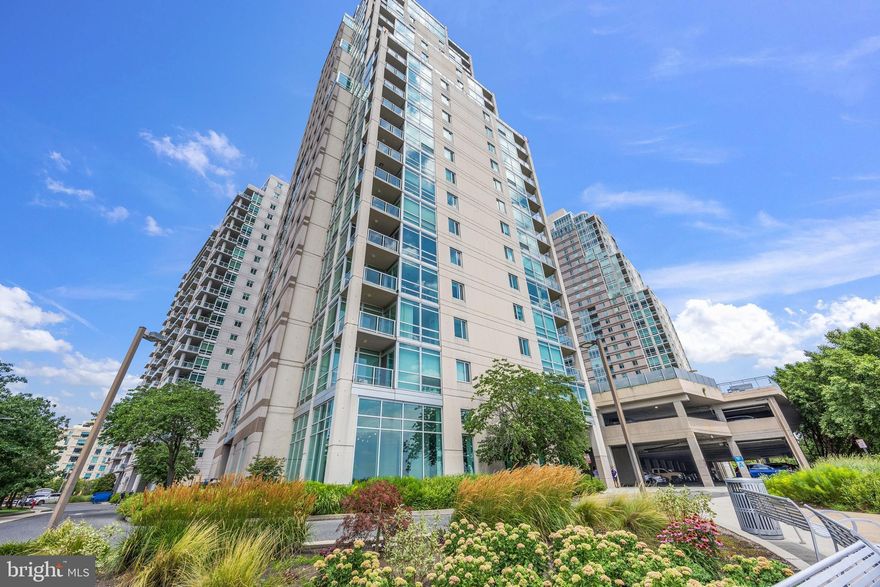 Welcome to Unit P506 at Waterfront Square! This corner one-bedroom condo offers beautiful waterfront views —all framed by floor-to-ceiling windows. Inside, you'll find an open layout with hardwood floors and a modern kitchen featuring stainless steel appliances and granite countertops that flows into the living space. The oversized bedroom includes a closet with built-in shelving. The marble bathroom features a tub and wide vanity. A stacked washer and dryer is tucked away behind closet doors. This unit also comes with its own dedicated parking spot—a rare and valuable convenience in the city. Waterfront Square is a gated community offering valet parking, 24/7 security, a full fitness center, indoor pool, sauna, and on-site management. The building sits on nine acres of landscaped grounds, with breathtaking views of the Ben Franklin Bridge. Just minutes from restaurants, coffee shops, and major highways. A great opportunity to enjoy city living with comfort, space, and incredible views.