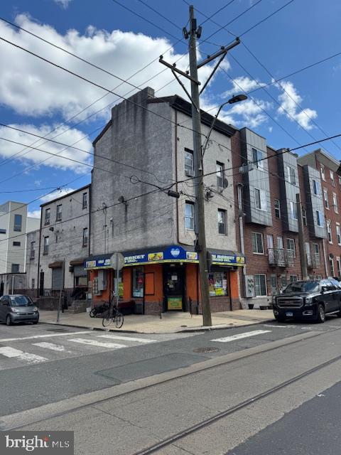 1) Two commercial spaces: one grocery store on the first floor and at the corner. The 2nd commercial soace is in the basement and entrance in the middle of the building. ($1575 + $625 =$2200 monthly)
2) 4 residental units on the 2nd and 3rd floor, one on the rear side of 1st floor : ($1080 + $930 + $880+ $1050 +$718 =$4658 monthly)
3) Annual rental income: ($2200 + $4658 monthly )=($82296 annually).
Corner property, under market rent, easy to lease, low vacancy.