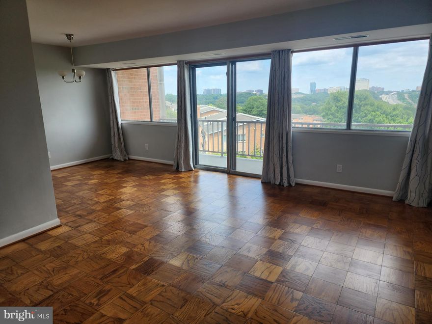 Great Price reduction!  Seller motivated to work with buyer.  Super Location!  Beautiful New Kitchen and Bath.  Wonderful Natural Light Throughout Unit.    Wall of windows makes this home feel spacious, bright and open.   Kitchen has been completely redone with new cabinets, countertops and all new appliances.  Bathroom has also been beautifully upgraded.  Balcony is expansive with wonderful views of the city.  All utilities are included in the condo fee.  Secured building.  Location is amazing so close to everything needed.  Why rent when you can own?