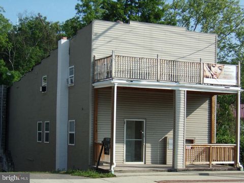 Photo of 14615 Mcmullen Highway SW, CRESAPTOWN, MD 21502 (MLS # MDAL2013874)