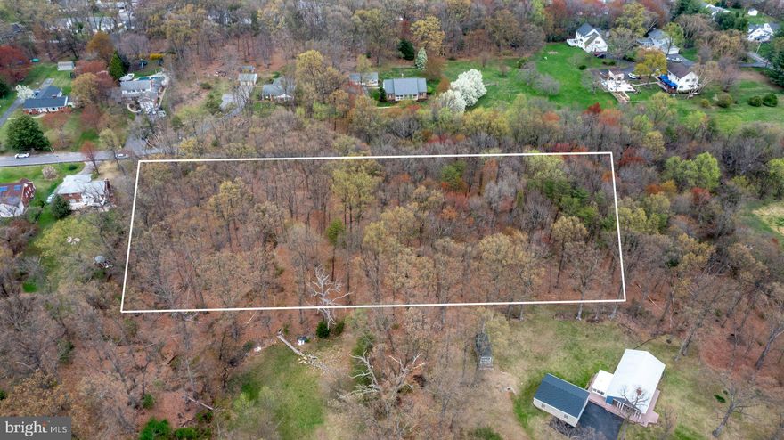 RARELY AVAILABLE 3.8 ACRE +/- Lot in Rosedale / Perry Hall area! Come build your dream home on this property! The property has a lot of privacy, has a stream going through it and wild life! The property offers a quiet haven to retreat to but also close to many shops, restaurants, and close to highways! Don't miss out on this opportunity! WATER AND SEWER already runs through the property. 600k valued home right next door.