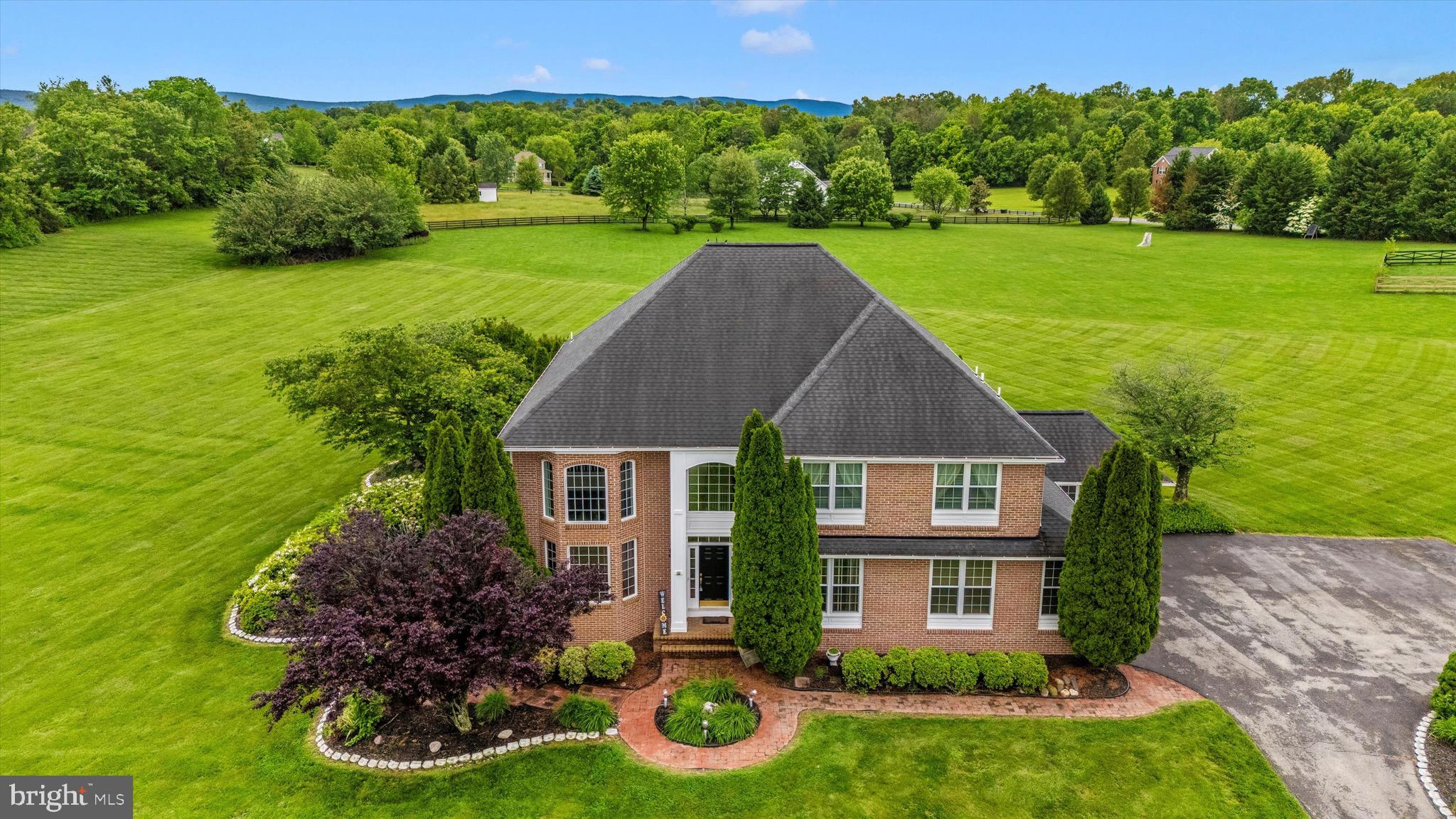 Welcome to this gorgeous 4-bedroom, 4.5-bathroom home in the highly sought-after Breckenridge North subdivision in Jefferson County, WV! This elegant property offers the perfect blend of comfort, style, and functionality. Talk about a head turner! AND an amazing location on top of that!
Immediately greeted by a beautiful grand foyer from the front door with a formal sitting area and official office...then step into a beautifully designed kitchen featuring granite countertops, a double oven, and ample space for cooking and entertaining. The gas fireplace in the living area creates a cozy ambiance, while brand-new UV windows throughout, thicker vinyl siding, and an updated long life roof (2013) adding lasting value and energy efficiency. An intercom system with six stations provides added convenience and seamless communication throughout the home.
The mostly finished basement offers additional living space, perfect for a home theater, office, or recreation area. Lush rhododendrons and vibrant crepe myrtles surround the home, enhancing its curb appeal and creating a picturesque setting. Outside, the meticulously maintained landscaping, a spacious patio, and an inground concrete saltwater pool provide a true backyard oasis for relaxation and entertaining. The attention to detail when designing the exterior features is great! The pool does have a fence around it, and professional landscaping surrounds it as well!
Lastly, the CARE that has gone into this home year after year is truly shown through when you walk around the house. The owners cared for every single detail.
This home is a rare gem in Shenandoah Junction. Don’t miss your chance to make it yours—schedule a showing today!