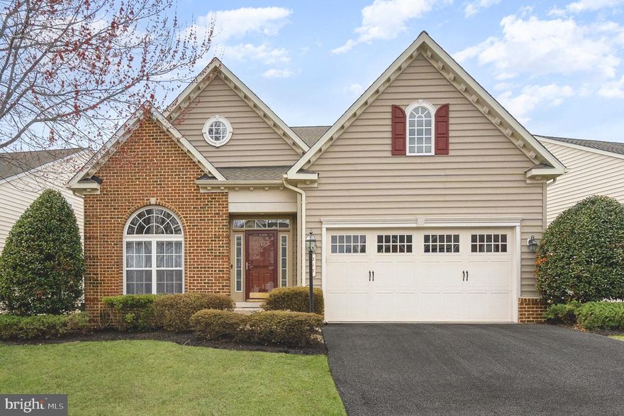 Welcome to this beautifully designed 4-bedroom, 4-bathroom home in the sought-after gated community of Bulle Rock with exceptional amenities! Step inside to an inviting main floor featuring a spacious vaulted living room with a gas fireplace, perfect for cozy evenings. The kitchen and dining areas flow seamlessly, connected by a butlers pantry, making entertaining effortless. The main floor boasts two bedrooms, including a luxurious primary suite with a spa-like ensuite bath, creating a private retreat. Upstairs, a versatile loft overlooks the living space and connects to two additional bedrooms via a convenient shared bathroom. The fully finished lower level is a dream, featuring luxury vinyl flooring, two bonus rooms, and a massive workshop for all your projects and storage needs. Outside, enjoy the composite deck and paver patio, perfect for relaxing or entertaining in your private backyard. As a resident of this premier gated community, you’ll have access to an expansive clubhouse with indoor and outdoor pools, a full gym, tennis courts, and more! Schedule your showing today! *New Roof in 2023, new HVAC system in 2024. New upstairs carpet and upgraded padding in 2024.