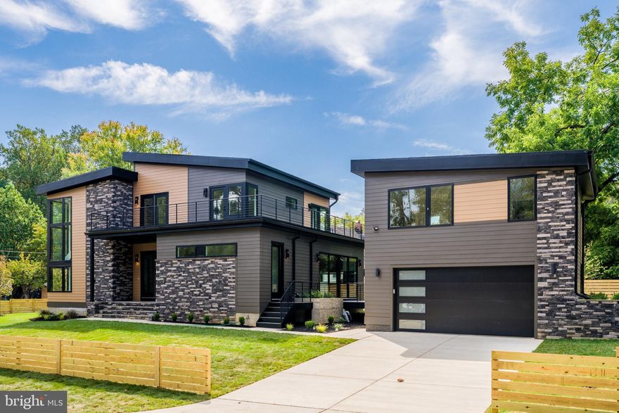 Newly Constructed.  Welcome to this one-of-a-kind dwelling which blends mid-century exterior form with modern interior design.  It was expertly crafted by NextDayRemodeling and designed by Axis Architects and backed by a Builder's Warranty.  This striking 5,600 SqFt custom build is situated on  1/3-acre premium, fenced corner lot, with a 400 SqFt apartment loft atop the detached garage (22'x20').  It spans 3 levels with 5 bright bedrooms and 5 luxurious baths (main house).  Garage parking for 2-cars, plus 4-car driveway, and 6-car curbside!  This home features an unrivaled open-concept plan perfect for modern living and entertaining. The stunning living room boasts 10-ft inverted tray ceiling with LEDs, Bluetooth ceiling speakers, fireplace accent wall, and deck access.  The gourmet kitchen features 10-ft waterfall quartz island, JennAir stainless appliances, two-tone cabinetry, walk-in pantry, and sgd to a second Trex deck.  On the main level, there is also an office, bedroom, and full bath.  Next to the dining area is a side door that leads to the mud room with a built-in bench and a pet washing station. A dramatic floating staircase with a corner wall of windows leads up to the vaulted family room with 15-ft ceiling height, skylights, and balcony access door.  The primary suite features floor-to-ceiling windows, luxurious soaking tub and shower, walk-in closet, dry bar, and private access to the balcony. Two other ensuite bedrooms and a separate laundry room complete the upper level. The open basement boasts a large recreation area, gym, wet-bar, ensuite bedroom, and walk-up stairs to the rear yard. The Bel Air neighborhood is tucked away yet minutes from major highways, I-495, I-66, Rt 50, East Falls Church Metro, and key destinations, such as, the Mosaic District, Tyson's Galleria, and Inova Fairfax Hospital.