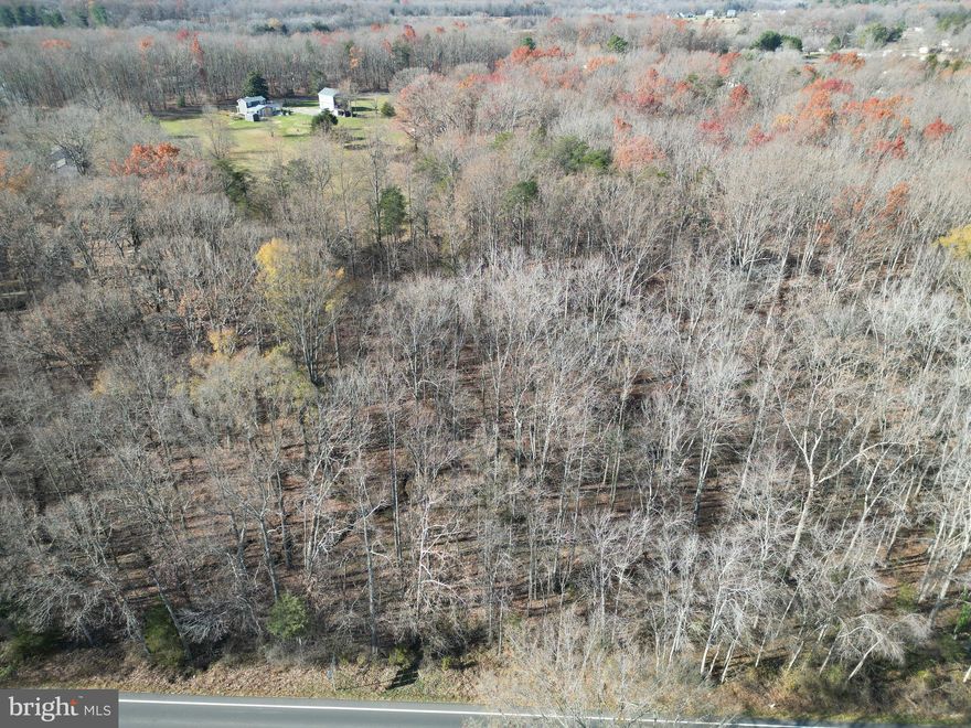 This beautiful completely wooded 15.4 acre lot is ready for you to complete the land improvements and make it your own! A stream runs through the property and there is 533 ft of road frontage.