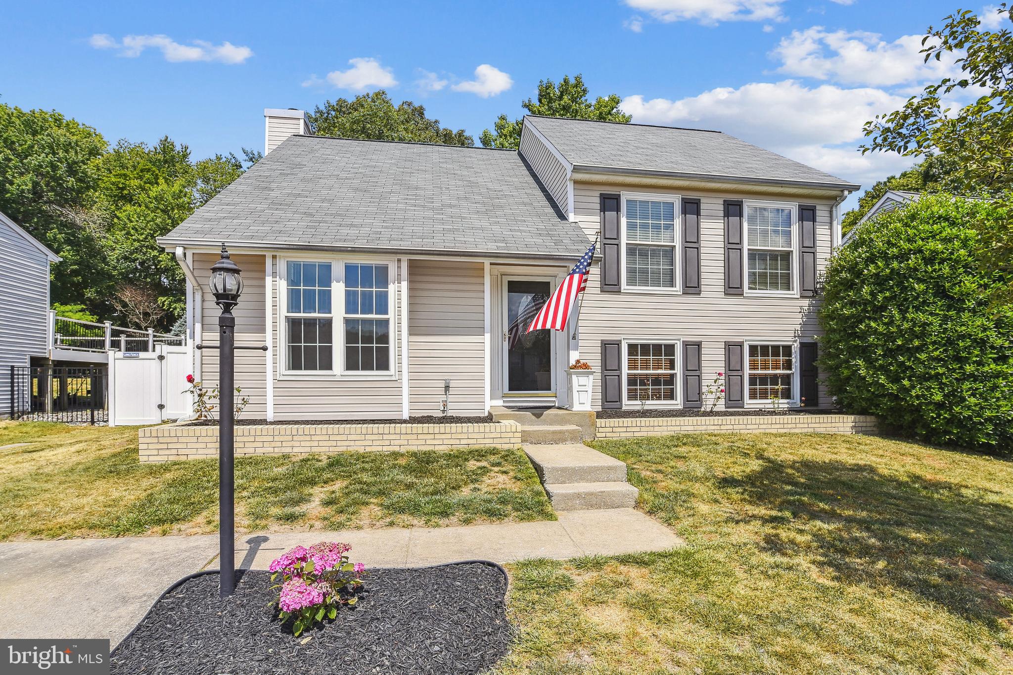 Exceptional home in Bay Country! When you walk in, the open floorplan & vaulted ceiling in the living room gives you that "welcome" feeling, Large open kitchen with sliders to a large deck overlooking a well-landscaped yard with a huge patio perfect for entertaining. The recently installed privacy fence makes it all the more cozy.
Lower level family room with wood-burning fireplace perfect for a lazy Sunday afternoon. A new roof was installed last year. There is nothing left to do here but move in and enjoy.