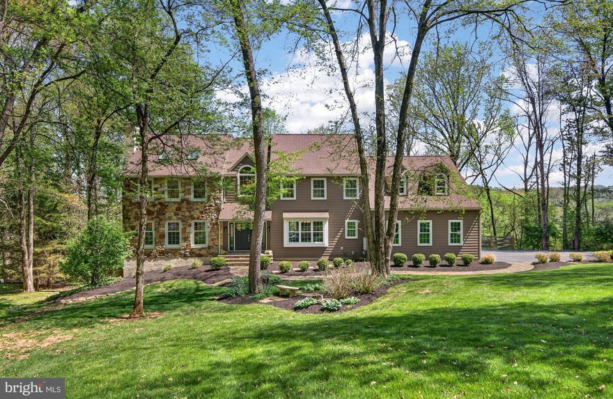 Welcome to 1207 Tullamore, an incredible 4-bedroom, 3.5-bathroom single-family home nestled in the highly desirable Tullamore neighborhood of Chester Springs, within the award-winning Downingtown East and Stem School District. Meticulously maintained and thoughtfully updated, this home offers the perfect blend of comfort, elegance, and everyday functionality—all set on a private and serene 1.1-acre lot with a beautiful wooded backdrop. Buy with peace of mind knowing the home has a new roof, new Hardie siding, new windows, and new doors. Step inside to a grand two-story foyer that sets the tone for the home’s inviting layout. To the left, a formal living room provides a refined space for entertaining, while the formal dining room to the right is ideal for hosting gatherings and special occasions. At the heart of the home, the spacious eat-in kitchen features a large center island with seating and a prep sink, 2 ovens, abundant cabinetry, and a convenient built-in desk. The sunlit dining area, surrounded by natural light from sliding glass doors, opens seamlessly to the back deck—perfect for indoor-outdoor living. The adjacent family room is both warm and impressive, boasting vaulted ceilings, skylights, a cozy fireplace, and a wet bar—an ideal setting for relaxing or entertaining. A private office with custom built-in shelving and tranquil backyard views offers the perfect work-from-home space. A half bathroom and laundry room complete the main level. Upstairs, retreat to the expansive remodeled primary suite, featuring vaulted ceilings, skylights, plush carpeting, and abundant natural light. A large walk-in closet provides ample storage, while the spa-like ensuite bathroom includes double vanities, heated floors, a jetted soaking tub, and a spacious glass-enclosed tile shower. Three additional generously sized bedrooms share a full hall bathroom, and an unfinished upper-level area offers even more storage potential (or great opportunity for a future oversized 5th bedroom and bath!). The finished basement expands your living space with endless possibilities—whether you envision a home theater, gym, game room, play area, or all of the above! A bonus room and full bathroom add flexibility and convenience. Out back, your private oasis awaits. Enjoy peaceful mornings and summer evenings on the expansive deck with long views of the Malvern-Great Valley landscape and beyond. A separate paver patio with a hot tub provides the perfect spot to unwind or entertain guests in total privacy. Experience the best of quiet neighborhood living while being just minutes from local parks including nearby Binky Lee and Bryn Coed trails, shopping, dining, and other local amenities that make Chester Springs such a sought-after location! Enjoy easy commutes with easy access to major roadways like Rt. 202 and the PA Turnpike. This is a home you won’t want to miss!