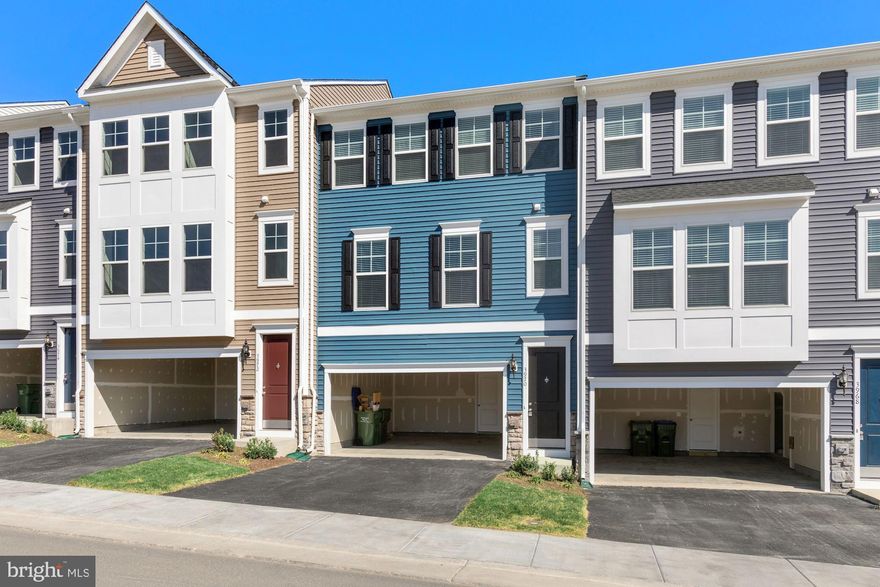 Welcome to this spacious 3BR/2FB/2HB townhome featuring an attached 2-car garage and a bright, open layout. The kitchen boasts granite counters and stainless steel appliances. Pets allowed on a case-by-case basis. No smoking. Located minutes from Quantico, VRE, shopping, and all major commuter routes. Move-in ready now.