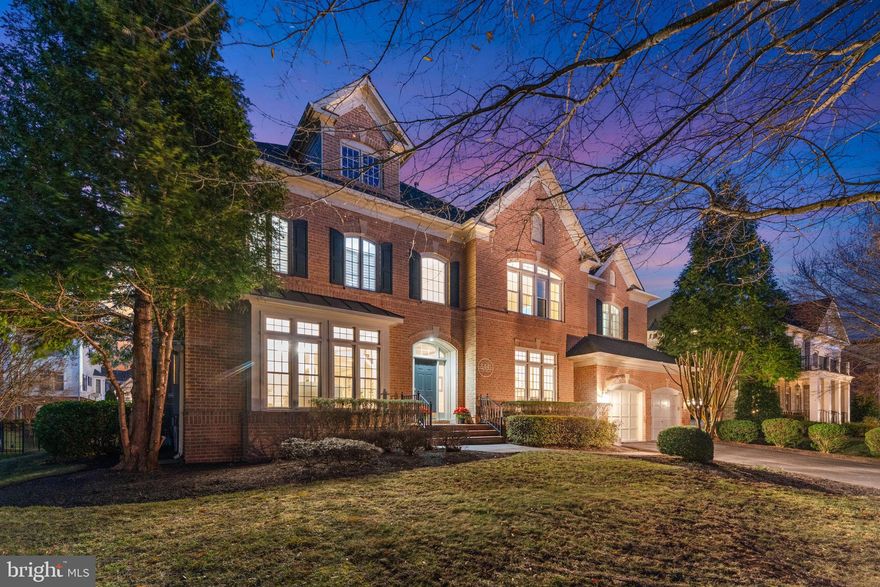 Located in a prestigious gated golf community, this exceptional home offers nearly 7,000 square feet of finished living space—one of the largest and most sought-after models in the neighborhood. A grand two-story foyer opens to a light-filled layout with elegant moldings, new flooring, upgraded lighting, and freshly painted interiors—perfect for both everyday living and entertaining. The updated gourmet kitchen features new cabinetry, quartz countertops, and ample space for gatherings. Recent upgrades include a new laundry room with washer and dryer, dishwasher, and enhanced garage. The luxurious primary suite is a private retreat with a spa-inspired bathroom, while bonus rooms on the main and upper levels provide flexible options for an office, guest suite, or playroom. The finished lower level is designed for entertaining, featuring hardwood floors, a large recreation room, custom bar, and a home theater for the ultimate movie experience. Outside, a spacious deck overlooks a private, landscaped backyard with irrigation, ideal for dining and relaxation. Blending timeless elegance, modern upgrades, and expansive space, this home offers an unparalleled lifestyle in an exclusive community.