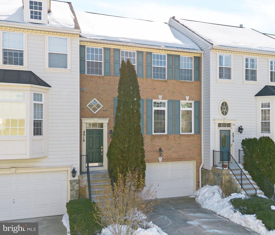 One of the most adorable and meticulously maintained townhomes in Barnsley Manor Estates is ready for you! Featuring 3 spacious bedrooms and 2 full and 2 half baths, this move-in-ready home shines with natural light throughout. This entire home has been freshly painted, and the refinished, gleaming hardwood floors throughout the main level lead into a formal dining area and the kitchen. The kitchen is ideal for entertaining, with a custom-made bar top that provides additional seating or prep space. Stainless steel appliances, upgraded counters, and recessed lighting are all standout features of the kitchen. The spacious bedrooms include the primary suite, with vaulted ceilings and an ensuite featuring a soaking tub, dual vanities, and a standalone shower. Downstairs is no different, with a showstopper brick fireplace and walk-out access to the backyard. Relax on your deck and overlook the privacy of the wooded trees. This one is absolutely incredible from top to bottom, so don't miss out!