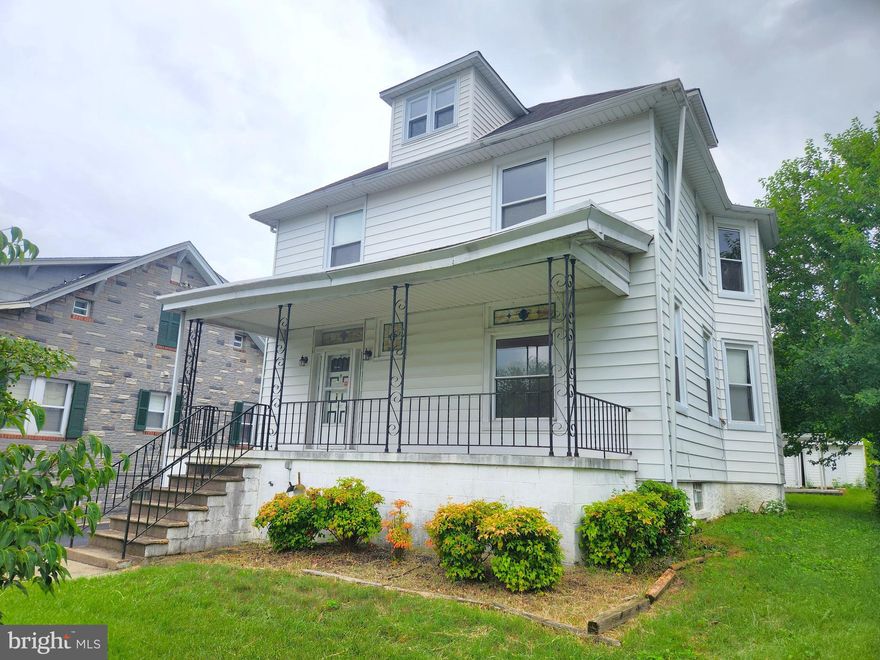 Multiple offers received. Offer Deadline 12/17 at 11:59pm. Spacious porch front colonial in the north east corner of Baltimore! This 5 bedroom 3 bath home boasts hardwood floors, 3 levels of living, plus an unfinished basement. The second level has an additional kitchen with a side entrance, potential for an in-law suite. Enjoy original charm with the stained glass windows & matching transom over the front door. There is an oversized 2 car garage with attached workshop perfect for the hobby enthusiast or additional storage. Enjoy the covered rear patio or use it as a carport for additional covered parking.