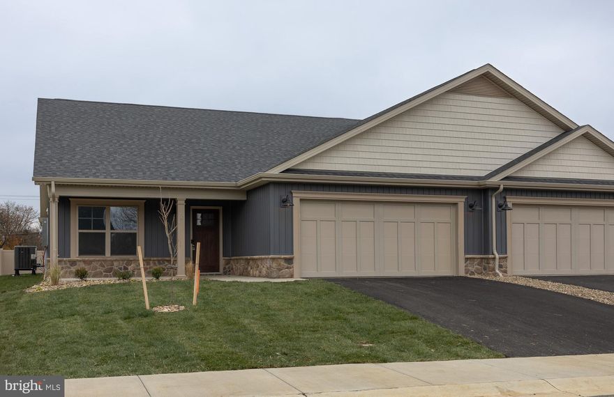 PHOTOS ARE REAL AND OF THE ACTUAL HOUSE!  Construction is complete and this house is available for quick move in.  This is the LAST TWO BEDROOM villa available in this new 55+ community.  The HOA fee covers LAWN MOWING, SNOW REMOVAL (roads, driveways and sidewalks!) and even weekly CURBSIDE TRASH!   Choose from 2 of these 4 builder incentives: free washer & dryer set from Spicher's up to a $2,500 value, $4,000 towards closing costs, $2,000 credit for new blinds from Budget Blinds of Martinsburg OR the first year of HOA dues paid!!   

The Villas at Warm Springs is a small 55+ community with sidewalk-lined streets located near shopping, dining, medical services and the interstate.  LOW MAINTENANCE & ACCESSIBLE living - zero barrier ceramic tile shower with grab bars and hand held shower head, 36" wide doorways with lever handles, no step thresholds - LVP Throughout, no carpet!  Spacious laundry room with a sink directly off the Owner's Suite.  Sodded lawn with low maintenance landscaping.  Available for tours NOW!