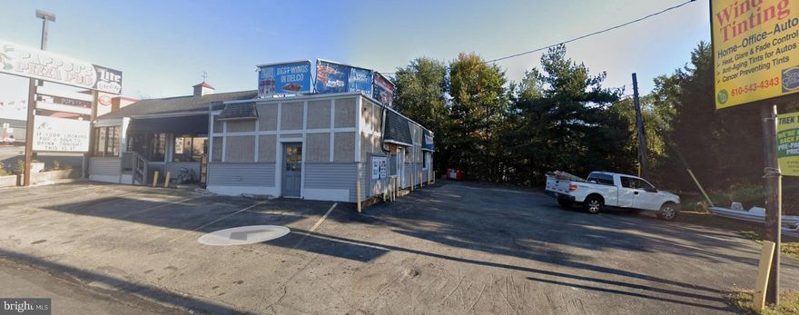 Prime commercial opportunity on the highly traveled Baltimore Pike “Golden Mile,” with exceptional visibility and multiple revenue streams, and 1 additional separate parcel (two lots total)   80 Ft. Frontage on Balt. Pike "Golden Mile " 14 Parking Spaces + overflow  parking available. providing excellent flexibility for parking, expansion, or future development. The property features a spacious dining area, bar setup, and commercial kitchen. With strong traffic counts, excellent frontage in an established commercial corridor, this is a rare chance to acquire prime real estate. "R" Liquor license also available for an additional $250k! Serious and qualified buyers may contact the listing agent for pricing, financials, and showings.  Motivated sellers!!