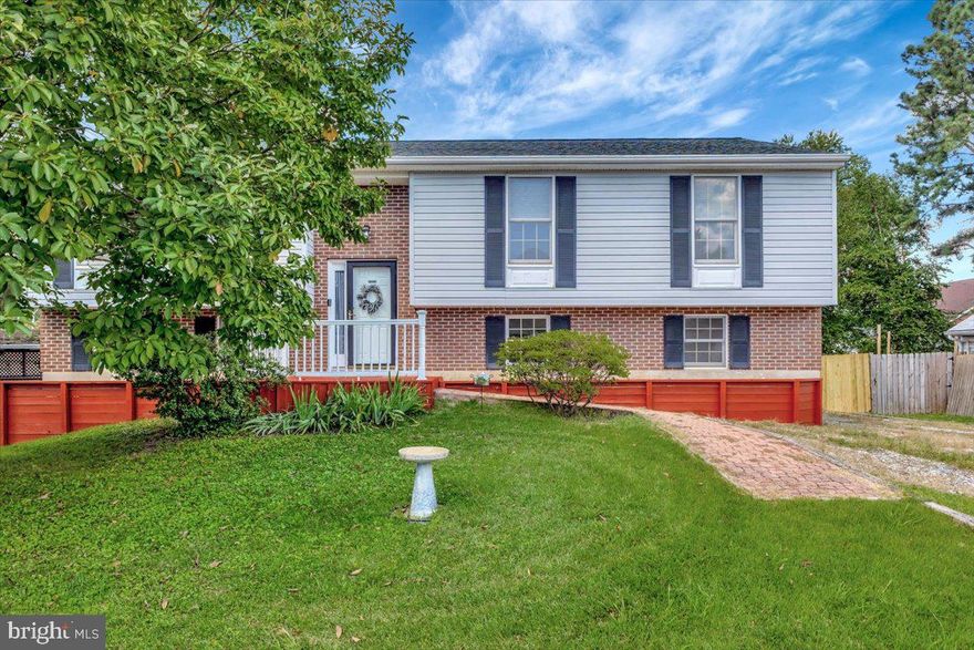 Beautiful 4 Bedroom & 3 Full bath home on over 1/4 acre with above ground pool and large garage to store your cars and boat! This home has a water view and is just a little over 1 block from the water! Bring your boat and move right in! Large updated eat in kitchen with stainless steel appliances and granite countertops. Sliders from the kitchen lead to the 2 level deck and above ground 23 ft pool with new liner 3 years ago! Large rear yard with separate shed with electricity for more storage. Architectural shingle roof 2014 with a 30 year shingle! Original owner & smoke free home! Walking distance to the water and only minutes away to launch your boat!