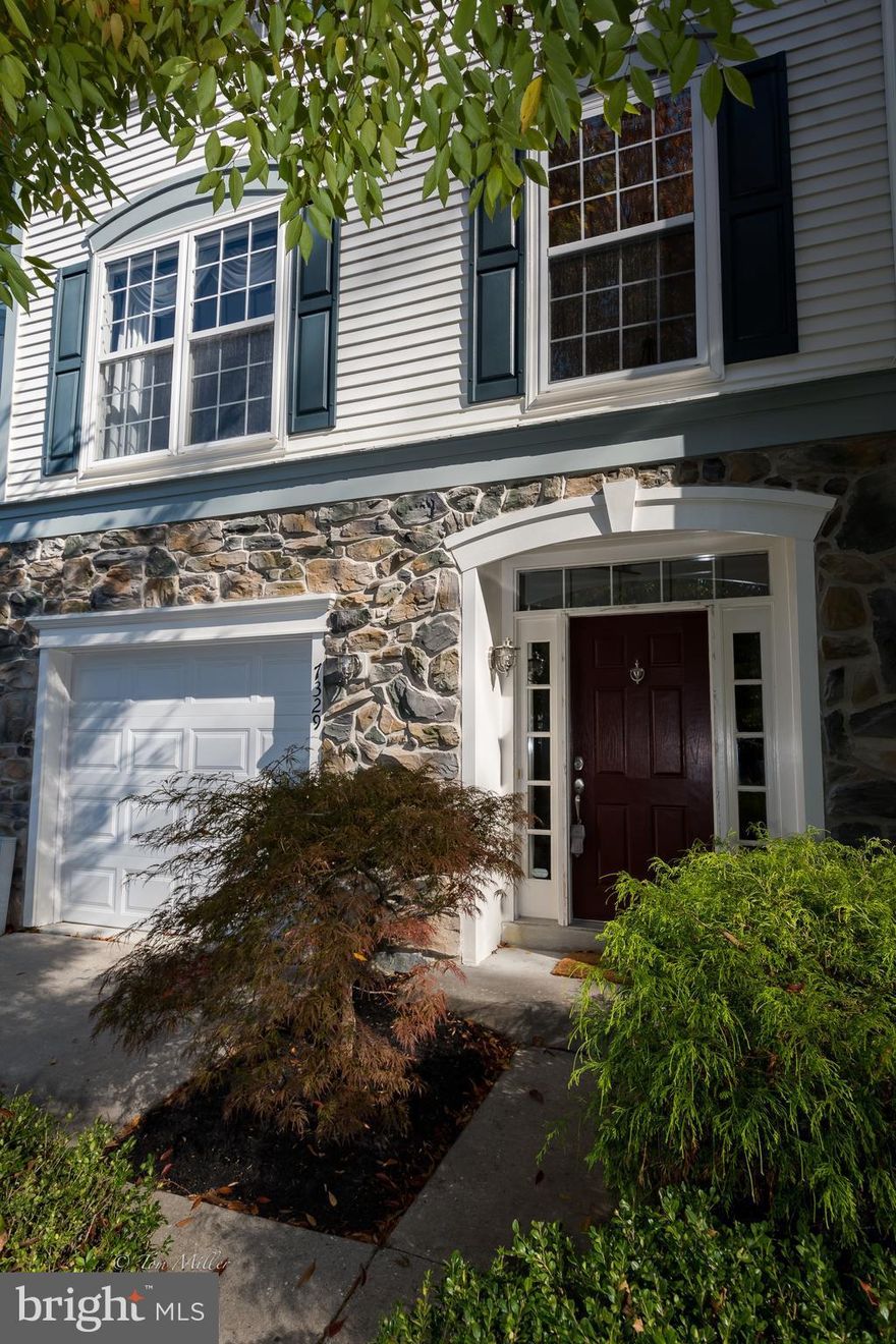 LIVE AT THE FINEST  LOCATION AND ELEGANT STONE FRONT  TOWNHOUSE!  SECLUDED - PEACEFUL -COMMUNITY! 3 LEVELS WITH LARGE DECK IN THE BACK  FOR OUT DOOR PARTIES -  OPEN FLOOR PLAN-HARDWOOD FLOOR ON MAIN LEVEL-SPACIOUS MASTER BEDROOM -  FULL BATH-SEPARATE TUB-WIC -GRANITE COUNTERS TOPS- AWESOME FAMILY ROOM WITH FIREPLACE AND CORK FLOORS- PERFECT LOCATION  TO BAL-WASH!!