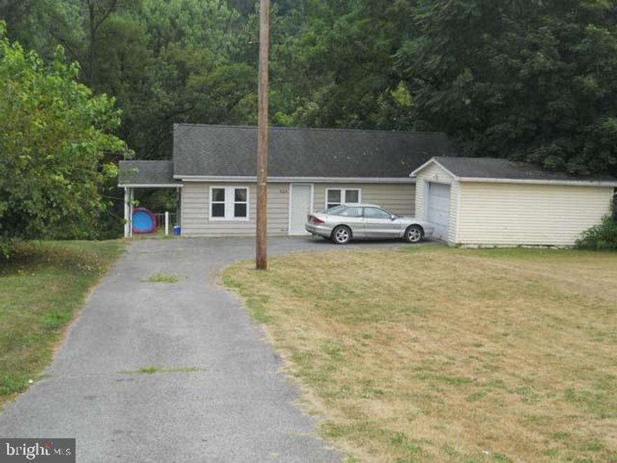 Nicely remodeled investment single family home or starter home...many newer quality upgrades including pergo floors in the newer kitchen. Master bedroom has a walk in closet and master bath. This home is currently rented with good tenants.  Or live in it with payments cheaper than rent...
