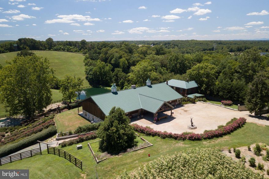 Located in the heart of Palmyra, Chinquapin Hill is a historic estate with roots dating to the early 1800s, making it one of the oldest homes in the area. Spanning 123 acres along the scenic Rivanna River, the property features a mix of rolling pastures, mature woods, and over 1,000 feet of river frontage. The original residence showcases early Virginian architecture and craftsmanship, retaining much of its historic character. In 1995, a well-integrated lodge was added, offering functional space while complementing the property’s rural charm. The land supports a range of uses, from small-scale farming and trail riding to hunting and recreation. Its blend of open fields and woodlands creates both beauty and utility, with direct river access. Ideally located just minutes from the Fluvanna County Courthouse Historic District and a short drive to Charlottesville, Chinquapin Hill is a rare opportunity to own a significant piece of land that combines historic value, natural beauty, and modern potential in a private yet accessible setting. With its unmatched combination of history, acreage, and location, this estate is well-suited as a personal retreat, working property, or investment in Virginia’s storied countryside.