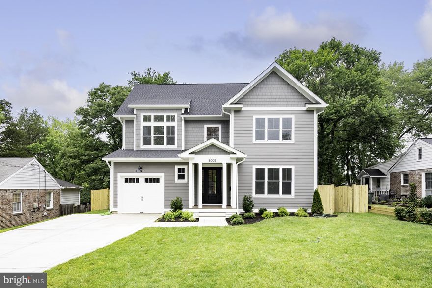 Beautiful Custom Home by Reputable Local Builder with over 30 years of experience, located in the sought-after Waynewood Elementary School District. With 3,500 finished square feet, this one-of-a-kind, energy-efficient, 3-level home features 5 bedrooms, 4.5 baths, and a garage.
FIRST FLOOR: Features a main floor bedroom with a full ensuite, including a barrier-free shower, to keep your guests comfortable in their private area. A powder room, a mudroom including custom cubbies, a large walk-in pantry, and access to the garage and side yard. A light-filled open-concept kitchen//family/dining room with a large gas-burning fireplace, flanked by built-in bookshelves. French doors lead to a large deck with a permanent gas hookup for grilling. A chef’s kitchen with plenty of storage, shaker-style cabinets, a custom hood, quartz countertops, tiled backsplash, a large farmhouse sink, and an island with seating for 4.
SECOND FLOOR: Includes a private owner’s suite, with a large walk-in closet, gorgeous bathroom with soaking tub, large glass-enclosed shower, and a custom double sink vanity. Two additional large bedrooms, one with a vaulted ceiling. A hall bath with a double sink vanity area that can be closed off from the toilet/tub/shower area for easy sharing. Off the second-floor hallway, find a large storage closet and a laundry room with natural light, sink, custom cabinetry, and quartz countertops.
THIRD FLOOR: Features a large bonus recreation room, full bathroom, bedroom/office area, and accessible attic storage.
INCLUDED UPGRADES: This quality home features 9’ ceilings, MI Windows, engineered hardwood flooring, solid-core interior, and barn doors, 2 separate Carrier Heating/Air Conditioning zoned systems, a tankless water heater with infinite hot water, CAT-6 wiring with multimedia outlets, Hardie-plank siding, and a lifetime architectural shingled roof. Plus, the garage is wired for electric car charging.
PERFECT LOCATION: Located on a quiet street in Hollin Hall, convenient shopping and dining are
 within walking distance. Lots of parks, pools, and pickleball courts nearby. Just minutes from the George Washington Parkway with easy access to Old Town, DC, Reagan International Airport, and Hwy 495.