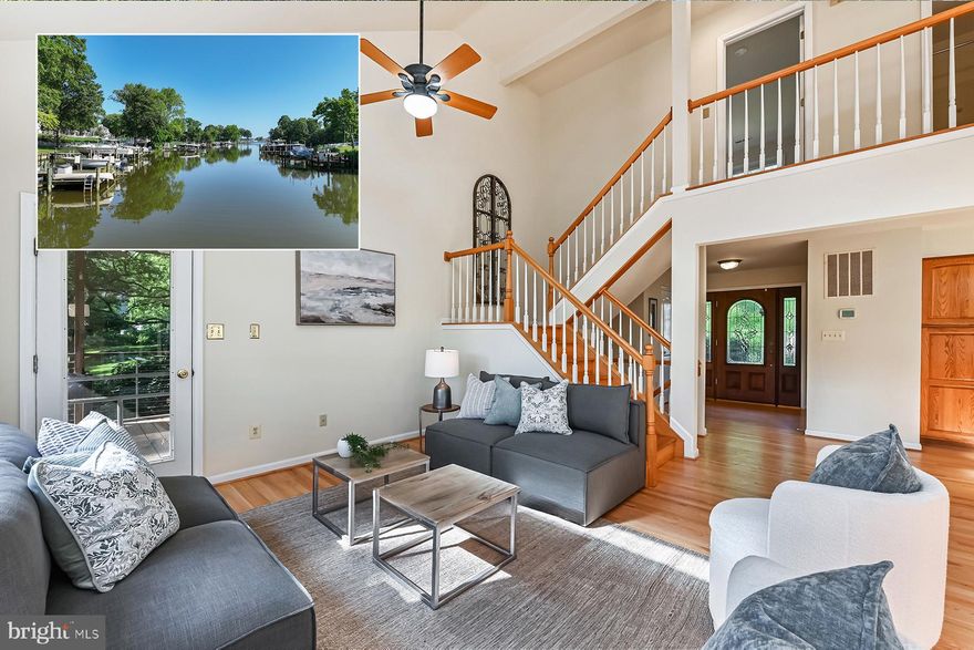 Welcome to 4119 Waterview Drive, a beautifully maintained 5-bedroom, 3.5 bath home, located on protected Ramsay Lake. Ramsay Lake provides boating access to the South River and out to the Chesapeake Bay. One of the nicest features of the half-acre property is the extensive landscaping and privacy, creating a park-like setting for this lovely home.
The inviting, open layout, recently refinished hardwood floors throughout, and a main-level primary suite make for effortless living. The heart of the home features a bright kitchen with granite countertops and adjacent pantry that flows into the spacious great room. Brand new skylights with automated shades add to the abundant light in this two-story space that’s ideal for entertaining or relaxing. On one side of the great room there’s a screened porch for al fresco dining. The other side of the great room opens to a waterside balcony that also connects to the main level primary bedroom. Both spaces offer a soothing outdoor experience where you can unwind and enjoy the views. 
The primary bedroom suite includes a spa-like bathroom with soaking tub and separate shower. Also on the main level, you’ll find a mudroom/pantry with laundry, and a powder room. Upstairs, there are three spacious bedrooms and an updated hall bathroom. All of the bedrooms have wonderful closet space, hardwood floors, and plenty of natural light.
The walk-out, lower level provides a flexible space for friends or family with two bedrooms, a full bath, and a family room. Or, set up your home office here with garden and water views. The oversized, two-car garage offers ample storage. Set on a gently sloping lot, the large backyard is professionally landscaped and out of the flood plain — a perfect blend of beauty and function. Geothermal heat gives maximum energy efficiency. With 3+ ft water depth and a private pier equipped with a boat lift, this location is perfect for launching your next adventure. Beverly Beach Triton Park is minutes away; it's a nature and beach lovers paradise with scenic walking trails and fishing. Mayo Beach Park is another great option, where you can enjoy swimming and the beach.
