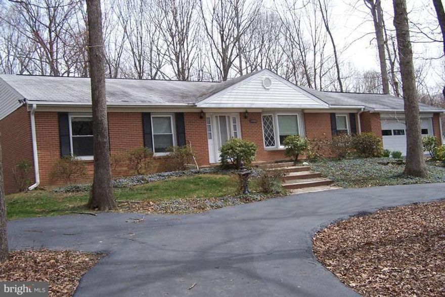 Custom RAMBLER on 1.26 ACRES..Fantastic WOODED Views..4 Bedrooms and 3 Full Baths..OVER 2905 Square Foot of Finished Area..Huge MASTER Bedroom with Handicapped Full Bath and WALK-IN Closet.Over Sized Country Kitchen with Pellet Stove..Rear DECK ..Recent Upgrades include Windows, Siding, Heating & Colling System,Water conditioning System, Range, Flooring Main Level.