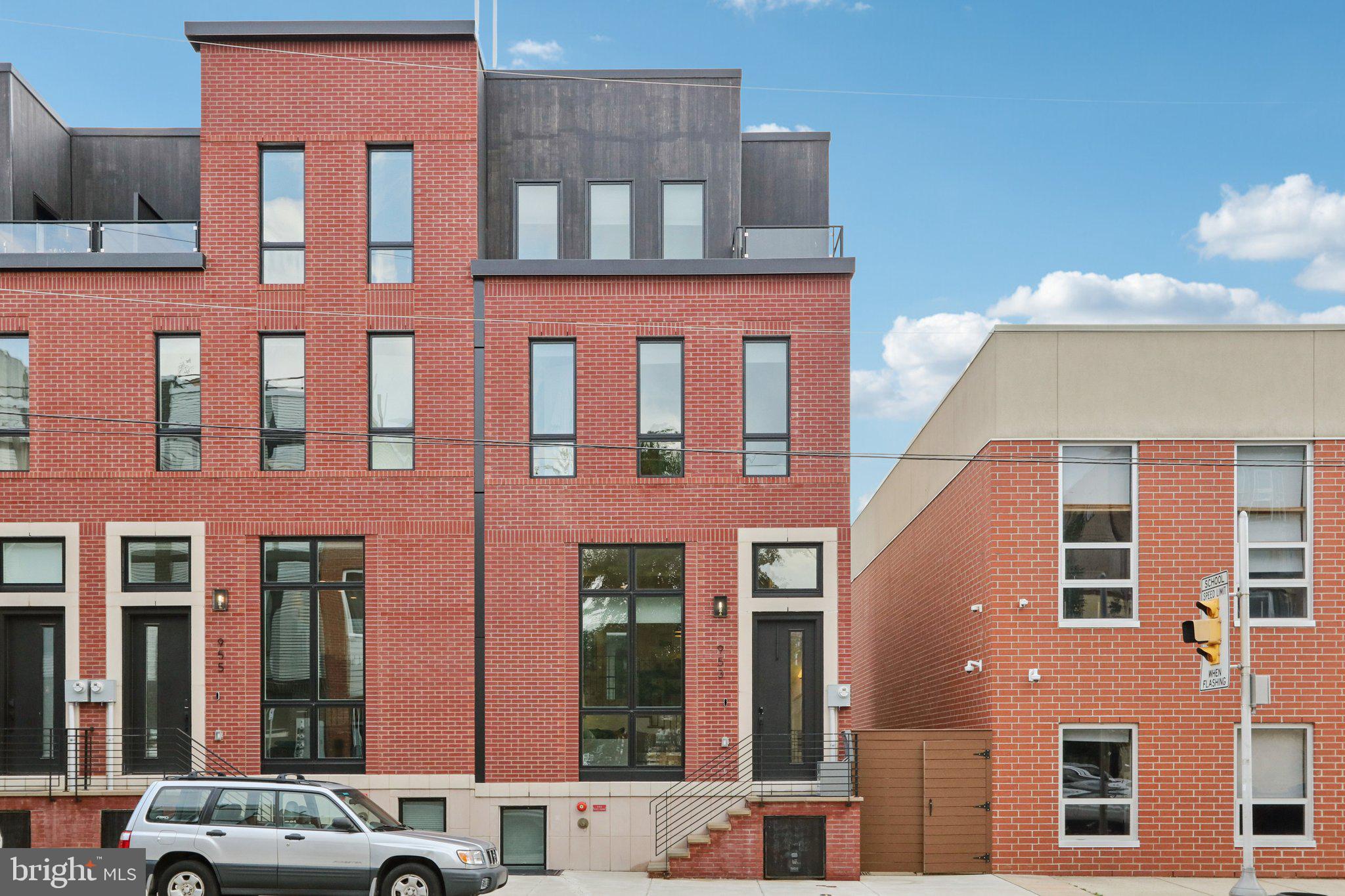 Welcome to your dream home at 953 N Marshall St in the heart of Philadelphia's vibrant Northern Liberties. This stunning townhouse, less than 2 years old, is part of the exclusive 34-townhome community, Wendle Place, crafted by one of the city's premier developers, designed by the renowned Gnome Architects and constructed by the perfectionists at GRIT Construction team. This home is the first resale home in the community featuring over $30,000 of upgrades from a standard spec package!
Spanning over 3,000 sq ft of living space, this property is not just a home; it's a statement. Its modern layout incorporates a gas fireplace that adds a touch of warmth to the living room (pun intended), which is further enhanced by an elegant coffered ceiling. The expansive island with its waterfall countertop is the centerpiece of a chef's kitchen equipped with a high-end Bosch Stainless Steel Appliance Package, setting the stage for culinary exploration and entertainment.
Boasting 3 bedrooms, 3 full baths and 2 half baths, space is of no concern. Over 13-foot ceilings in the living room create a feeling of grandeur, with a double-height floor plan that bathes the space in natural light. The main floor also features a convenient powder room for guests.
The spa-like primary bathroom offers a sanctuary with its soaking tub and a large dual rain head stand-in shower, complete with a built Âin bench for the ultimate in relaxation. Entertain in style with a wet bar on the third floor, just steps from the entrance to your private rooftop featuring a green roof system that not only beautifies but provides temperature regulation and cooling.
A fully finished basement with access to a 2-car garage adds to the convenience, while multiple outdoor spaces invite serene moments and city views. This home comes with over 8 years left on a full 10-year tax abatement, adding incredible value.
Nestled in a location that's hard to beat, a short walk connects you to fan-favorite cafes, restaurants, the pedestrian-friendly Liberties Walk, charming boutiques, bike paths, and easy public transportation access to Center City. This stunning townhouse offers unmatched style, comfort, and convenience for truly sophisticated city living. Don't wait to make 953 N Marshall St your new home address.