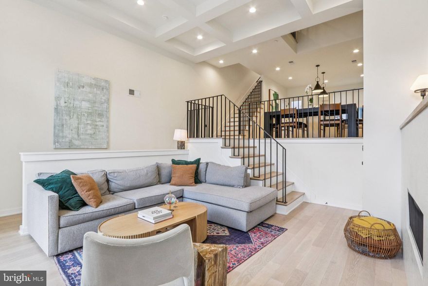 Qualifies for 100% financing, NO PMI, $5,000 lender credit, must be for primary residence! Welcome to your dream home at 953 N Marshall St in the heart of Philadelphia's vibrant Northern Liberties. This stunning townhouse, less than 2 years old, is part of the exclusive 34-townhome community, Wendle Place, crafted by one of the city's premier developers, designed by the renowned Gnome Architects and constructed by the perfectionists at GRIT Construction team. This home is the first resale home in the community featuring over $30,000 of upgrades from a standard spec package! 

Spanning over 3,000 sq ft of living space, this property is not just a home; it's a statement. Its modern layout incorporates a gas fireplace that adds a touch of warmth to the living room (pun intended), which is further enhanced by an elegant coffered ceiling. The expansive island with its waterfall countertop is the centerpiece of a chef's kitchen equipped with a high-end Bosch Stainless Steel Appliance Package, setting the stage for culinary exploration and entertainment. 

Boasting 3 bedrooms, 3 full baths and 2 half baths, space is of no concern. Over 13-foot ceilings in the living room create a feeling of grandeur, with a double-height floor plan that bathes the space in natural light. The main floor also features a convenient powder room for guests. 

The spa-like primary bathroom offers a sanctuary with its soaking tub and a large dual rain head stand-in shower, complete with a built ­in bench for the ultimate in relaxation. Entertain in style with a wet bar on the third floor, just steps from the entrance to your private rooftop featuring a green roof system that not only beautifies but provides temperature regulation and cooling. 

A fully finished basement with access to a 2-car garage adds to the convenience, while multiple outdoor spaces invite serene moments and city views. This home comes with over 8 years left on a full 10-year tax abatement, adding incredible value. 

Nestled in a location that's hard to beat, a short walk connects you to fan-favorite cafes, restaurants, the pedestrian-friendly Liberties Walk, charming boutiques, bike paths, and easy public transportation access to Center City. This stunning townhouse offers unmatched style, comfort, and convenience for truly sophisticated city living. Don't wait to make 953 N Marshall St your new home address.