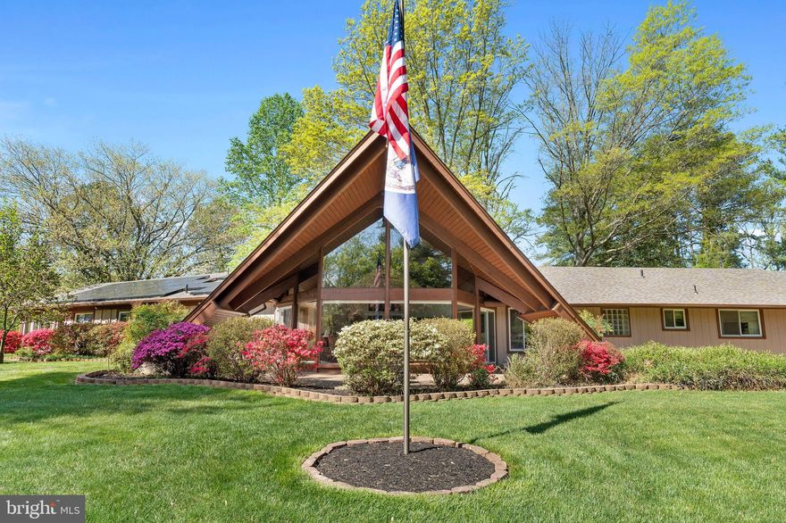 Stunning contemporary one-level home situated on a large 2 acre lot with in ground heated saltwater pool! Two master suites for added convenience, perfect for those who prefer the option of privacy as well as those who prefer to be near to secondary bedrooms. This home boasts a bright and spacious great room with soaring vaulted ceilings, floor to ceiling windows, and opens to a private patio. The kitchen offers 42" cabinets, granite countertops, stainless steel appliances, gas cooking, and warm recessed lighting. The kitchen opens to the family room and dining room, centered by a cozy fireplace for cold nights. The primary bedroom suite is located in the private north wing of the home, and features a large walk in closet and bathroom with dual sinks, soaking tub, and walk in shower. The south wing of this home features the second master suite with private bathroom, and two more generously sized bedrooms, 1.5 bathrooms, convenient home office, as well as a sun room that leads directly out to the yard. Custom automatic blinds are installed on every window in the home, and nearly all windows and doors have been replaced. The outdoor space is an entertainer's dream, with a heated saltwater pool, built in pergola, and all new patio pavers. The three car garage offers an abundance of parking and storage space, with additional 3 space carport and long driveway. Brand new solar panels, new roof, new gutters and gutter guards, new pool liner and heater, and MANY more updates have been done (see documents for all updates!). Located just outside Old Town Manassas, yet secluded enough to feel like a personal retreat. Minutes to major commuter routes 234, 66, 28, and I95, highly rated schools, hospitals, shopping, dining, entertainment, and more. No HOA, MUST SEE!!!!  ACCEPTING BACK UP OFFERS