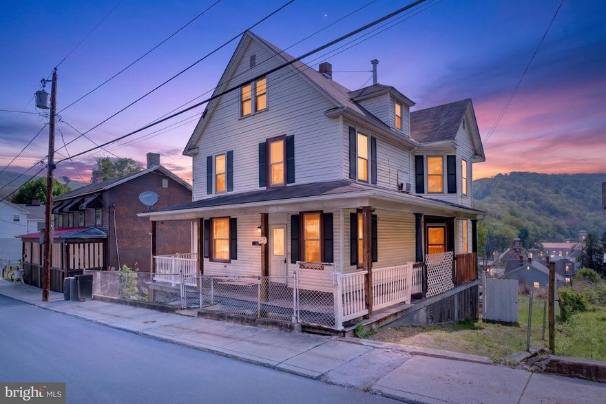 Beautifully Remodeled Home with Mountain Views in Westernport, MD! Welcome to this charming 6-bedroom, 1.5-bath home, offering both character and incredible potential. This property is a steal at this price, featuring significant updates including a newly installed electric box and meter, and ongoing plumbing work (water should be fully functional soon). The roof was mostly replaced just five years ago, adding durability and peace of mind. Recently renovated, the attic has been beautifully converted into 3 additional bedrooms, providing extra living space. The home also boasts a great wraparound porch for relaxing outdoors and offers on-street parking for easy accessibility. Nestled in the heart of Westernport, this home combines small-town charm with modern upgrades, making it a fantastic opportunity for buyers looking to add their personal touch. Space, location, and flexibility all come together here. Schedule your showing and see how it fits your next move. Sold As-Is, this one won't last long! "Some images may reflect virtual staging or digital editing, including removal of personal property, to help showcase the home."