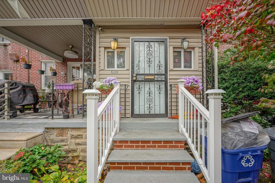 An absolute wonderful move right in home is now available in the Germantown neighborhood! Wow! Welcome to 4822 Knox St. You'll first notice the very nice newer staircase as you walk up to the front door. Then stepping inside to an enclosed porch area. This space is perfect for your bench, shoes, and coats. Especially when the snow arrives! Then walk into the living room that is just gorgeous. You'll find that what you see is nice all around. Bright lights, wonderful colors, very nice floors. There is a real wood burning fireplace in the living that is so cool and unique. Then into the dining room that is spacious and perfect for those large holiday gatherings and parties you'll be having. The large kitchen is just lovely. Plenty of cabinet space, an extra counter and cabinet storage on the opposite wall. And an area to have 2 bar stools so that you can cook and have conversations with your friends right there. Granite countertops. 
Upstairs there are 3 great size bedrooms. A very nice hall main bathroom. Down to the basement, you will be pleasantly surprised to find a recently remodeled, bright, clean, and usable basement. This could be a great rec room. And there is a small nook that could be an office or work space. Just awesome. This house has a large deck on it that you walk out onto from the kitchen. Its lovely and perfect. There is a powder room on the first floor located in the dining room. This home has had many renovations in just the past couple of years. It is so nice for a first time buyer or for anyone looking for a good house. And on a pretty block too. Retractable awning included As Is, works only by manual crank. This is the one.