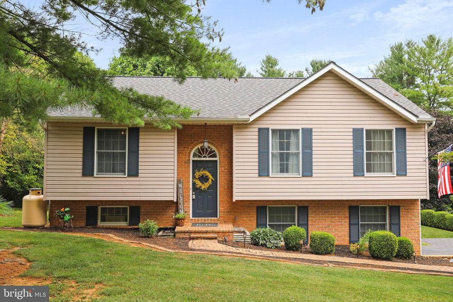 Welcome home to this well maintained 3 bedroom 2 bath home situated on over an acre of land! This beautiful contemporary finished home features an open concept main level, dine in kitchen, ample bedroom sizes, and stylish finishes! Downstairs you will find an additional living space, a full bathroom with jacuzzi tub, a laundry room, and a rec room! Among these beautiful features, this home also boasts  a roof less than a year old, updated kitchen appliances less than a year old, HVAC system less than 7 years old, newer water softener system, well pump, and well filtration system!  Enjoy the outdoors in your huge back yard or relaxing on your deck. The oversized yard includes a tot lot, a shed, and a blank canvas to bring your dream backyard to life! Don't forget the community access to the Potomac River! In addition, this home is located minutes from I81, and a perfect commuter location! This home has everything you need to be your next dream home!