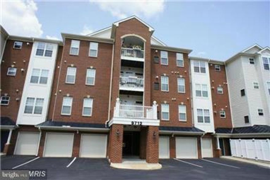 Call tenants First. Sentrilock on left side on bar, Fob too.Attached garage and driveway.   Large condo at 1480 sq ft w/ balcony/chairs.  Walking distance to Va Railway Express.  Lg master br & bath!  End unit. Full size W/D in own room and Dining room also. Balcony has sunsets !  Large Eat in Kitchen, Black Appliances.  Nice carpet and Paint.  Access controlled. Pool & Rec. Water/sewer included.