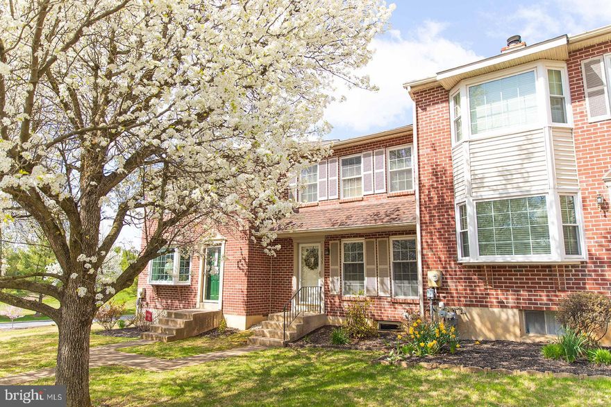 Welcome to 1053 E Boot Rd in West Chester, a beautifully updated brick townhome nestled in a serene and tree-lined community. This inviting residence boasts a perfect blend of modern design and cozy character across a bright and airy floor plan. Step inside to discover a completely renovated main level featuring stunning light-toned wide-plank flooring and an open-concept layout that seamlessly connects the kitchen, dining, and living areas. The designer kitchen is a true showstopper, offering sleek white cabinetry, an expansive center island with built-in storage, quartz countertops, and stainless steel appliances—including a gas range and overhead microwave. The spacious living area centers around a modern fireplace, framed by clean lines and thoughtful decor. Natural light floods the space through large windows and French doors that open to the back deck—ideal for entertaining or relaxing with ease. Upstairs, generous bedrooms and updated baths provide comfortable living spaces, all tucked within a quiet, well-maintained community. With thoughtful upgrades, a timeless brick exterior, and a fresh, minimalist aesthetic inside, this home is truly move-in ready. Don’t miss your chance to own this bright and beautifully designed home just minutes from local parks, shopping, dining, and commuter routes. Schedule your private tour today and see why this gem won’t last long!