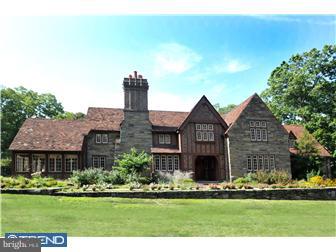 Classic Stone Tudor, majestically situated on 1+ acre in prestigious Rydal. This home has been lovingly and totally renovated with great taste. Old world character has been maintained and accented with all the amenities of today. State of the art new Kitchen/Pantry/Mudroom/Family Room w/granite counters, top of the line stainless appliances and wood floors. Fabulous addition also includes dramatic Master Bedroom Suite with balcony overlooking the grounds. His and Her Master Bath tastefully done with neutral d cor, beautiful floors and cabinetry. The entire Lower Level is perfect for recreation and entertaining. The "Diner" area boasts huge stone fireplace, built in cabinetry and eating area. Game and Media Room has a rear yard entrance. The flagstone patios, tiled pool, and amazing stone fireplace and grilling area make a perfect setting for outdoor living and entertaining. All new windows, plumbing, electrical, heating, air conditioning systems, and elevator. The entire house is wired for sound and security. Perfect inside and out!