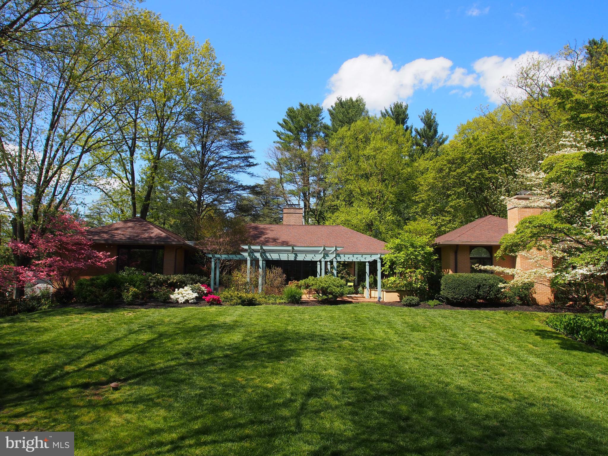 In-person showings available! One-on-one in-person showings are now allowed. Please contact the listing agent to schedule. Virtual tours are also available. This renovated & expanded transitional-style residence offers 5,314 square feet of finished living space, and provides utmost serenity & privacy along with easy access to the amenities of Bryn Mawr, Gladwyne & Ardmore, Located at the end of a quiet cul-de-sac beyond a gated entrance awaits beautiful 914 Sorrel Lane, nestled on 1.25 picturesque acres in a coveted location near it all! Experience that wow-factor of a stunning setting graced by thoughtfully-curated native tree & plant species, assuring ever-changing seasonal blooms & colors. Resort living is yours with a 60 swimmer s pool w/new gas heater, ideal for doing laps. Lounge/entertain while taking in the scenery on the fountained patio, pergola & garden-scape connecting to public rooms affording seamless indoor-outdoor parties. From every vantage point of this gem you ll enjoy magnificent views & beaming natural light.through glass walls, abundant windows, French doors & skylights. The open layout, flow & generous scale afford great usability for intimate nights or hosting a crowd. A front-to-rear reception hall welcomes you in & exudes elegance with hardwood floors & tray ceiling. The dramatic living room with a gas fireplace flanked by built-ins & tray ceilinged dining room both have window walls & glass doors to the outdoor oasis, complete with a grill area for barbecues. The showstopper JoAnn Hudson kitchen heightens functionality & style, featuring high-gloss Downsview cabinets, granite counters & top-of-the-line appliances for the chef including a new Wolfe 5-burner induction stovetop. Open from here is a sun-bathed breakfast area & vaulted family room with skylights inviting interaction as the cook creates. Also adjoining the kitchen is a convenient mudroom accessed via the family entry & 2-car garage, perfect when arriving home from work, the market, or with pets. Work at home in the tranquil office with adjacent powder room & glorious vistas of the pool & yard. Refresh in the deluxe master suite designed by architect Fred Bissinger with garden views, a sitting area, huge walk-in closet, sky-lit spa bath & laundry closet. For the comfort of family & guests are 2 additional en-suite baths, an en-suite on the lower level & 5th BR sharing a bath with the mirrored home gym that leads outdoors. Other highlights include fully-upgraded HVAC, fixtures & appliances, new Kolbe windows & doors, high-voltage landscape lighting, an insulated attic & whole house generator. Minutes away is Idlewild Nature Preserve & top Lower Merion schools!Virtual tours available! No in-person tours until the shelter in place order is lifted.