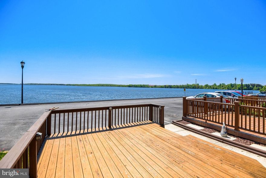 Discover the breathtaking water views from every level (without flood insurance premiums), where each day begins and ends with the beauty of the water. Spanning three levels of living space, this townhome offers over 1,800 square feet 3 Bedrooms, 2.5 Baths, and three expansive decks, perfectly positioned to capture stunning sunrises and unforgettable sunsets.

Freshly painted with new carpet and gleaming wood floors, the home is move-in ready and filled with natural light. The upper level features three spacious bedrooms and two full baths, including a serene primary suite with a private en-suite bath, two closets, and its own deck overlooking the water.

The open-concept main level is designed for both everyday living and entertaining, with a seamless flow between the living room, dining area, and eat-in kitchen, complete with a brand-new refrigerator. Beautiful water views, along with access to a patio and fully fenced backyard, make this space a perfect retreat to call home.

On the lower level, a cozy family room opens to yet another deck, creating the ideal setting to relax or host guests. This level also includes a bar area, a half bath, a laundry area, additional storage, and a sump pump for added peace of mind.

Additional highlights include two assigned parking spaces, private pier access, and a quiet, private street that enhances the home’s exclusive feel.

This is more than a home, it’s a lifestyle. Don’t miss your chance to own this rare waterfront opportunity and begin your next chapter here.  The private pier is exclusively for the 43 homes of Villa Capri. Streets, pier, and common grounds are maintained by the Community Association. 

This home is being sold as-is and priced accordingly.