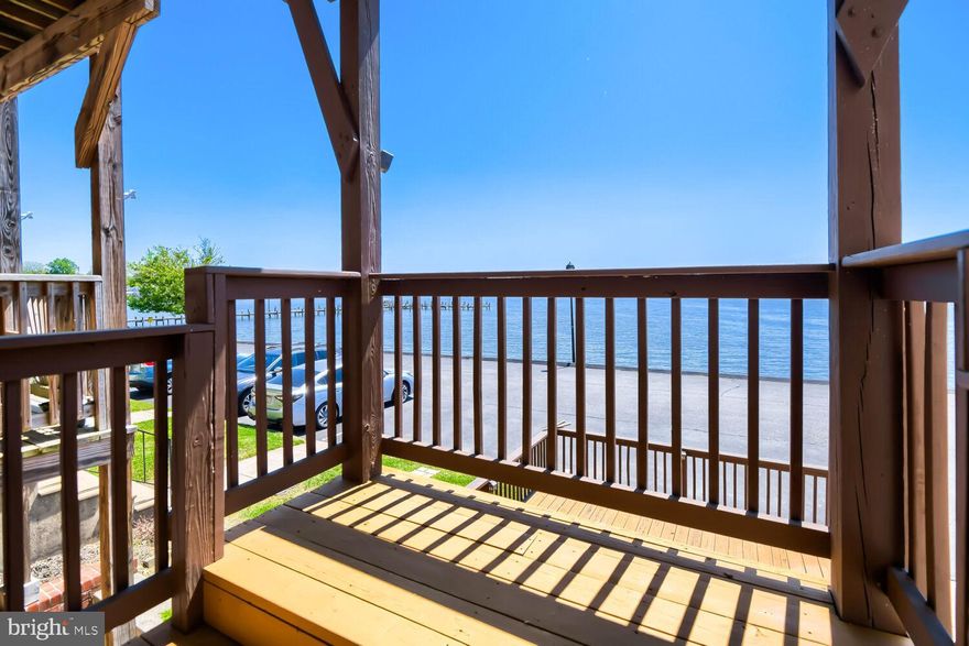 Discover the breathtaking water views from every level (without flood insurance premiums), where each day begins and ends with the beauty of the water. Spanning three levels of living space, this townhome offers over 1,800 square feet 3 Bedrooms, 2.5 Baths, and three expansive decks, perfectly positioned to capture stunning sunrises and unforgettable sunsets.

Freshly painted with new carpet and gleaming wood floors, the home is move-in ready and filled with natural light. The upper level features three spacious bedrooms and two full baths, including a serene primary suite with a private en-suite bath, two closets, and its own deck overlooking the water.

The open-concept main level is designed for both everyday living and entertaining, with a seamless flow between the living room, dining area, and eat-in kitchen, complete with a brand-new refrigerator. Beautiful water views, along with access to a patio and fully fenced backyard, make this space a perfect retreat to call home.

On the lower level, a cozy family room opens to yet another deck, creating the ideal setting to relax or host guests. This level also includes a bar area, a half bath, a laundry area, additional storage, and a sump pump for added peace of mind.

Additional highlights include two assigned parking spaces, private pier access, and a quiet, private street that enhances the home’s exclusive feel.

This is more than a home, it’s a lifestyle. Don’t miss your chance to own this rare waterfront opportunity and begin your next chapter here.  The private pier is exclusively for the 43 homes of Villa Capri. Streets, pier, and common grounds are maintained by the Community Association. 

This home is being sold as-is and priced accordingly.